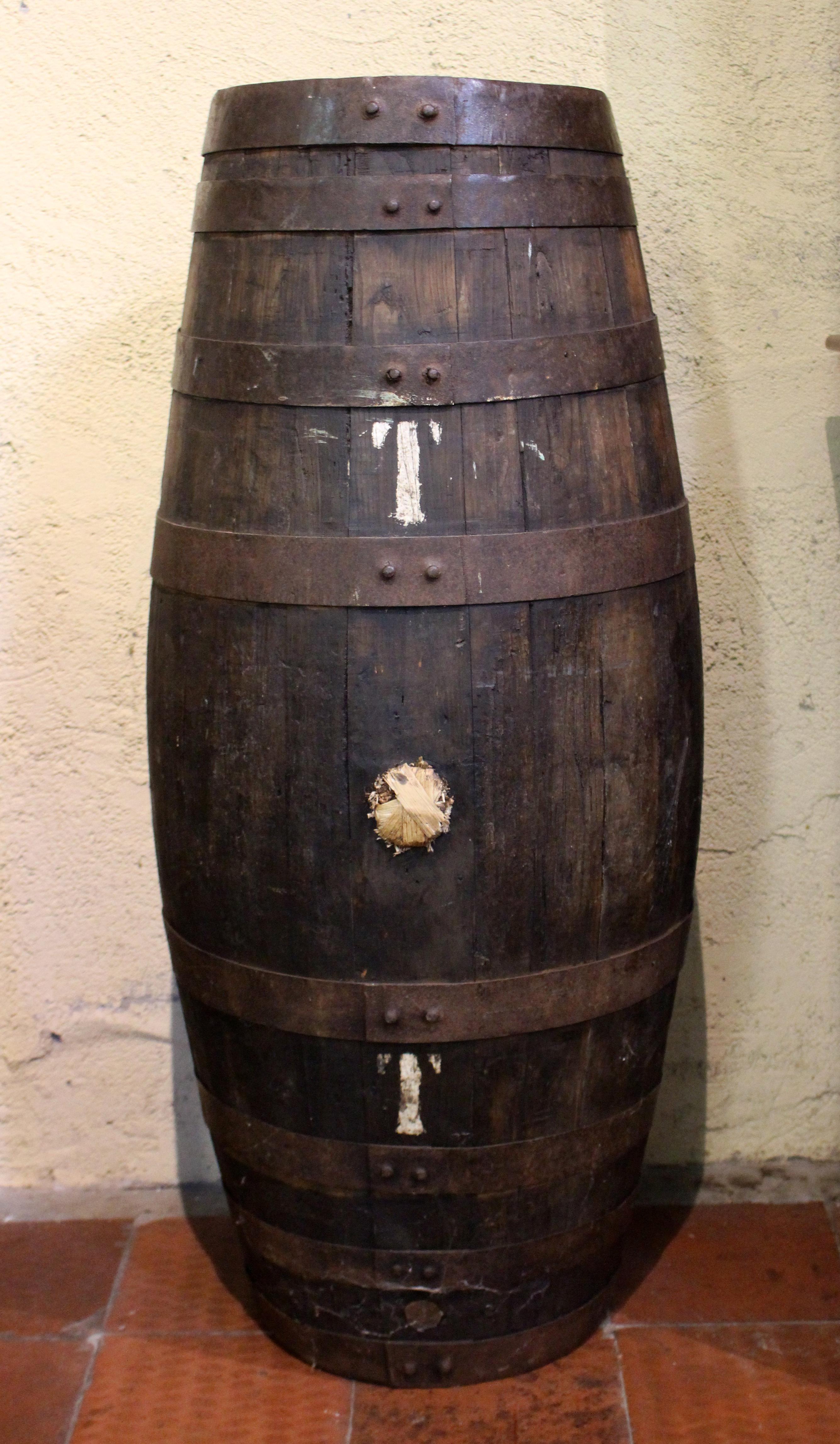 Circa 1900 or earlier oak Syrah wine barrel, French. Top carved 