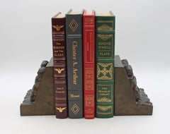 Circa 1900 Pair of Bronze Plated Bookends Featuring Reliefs of Putti