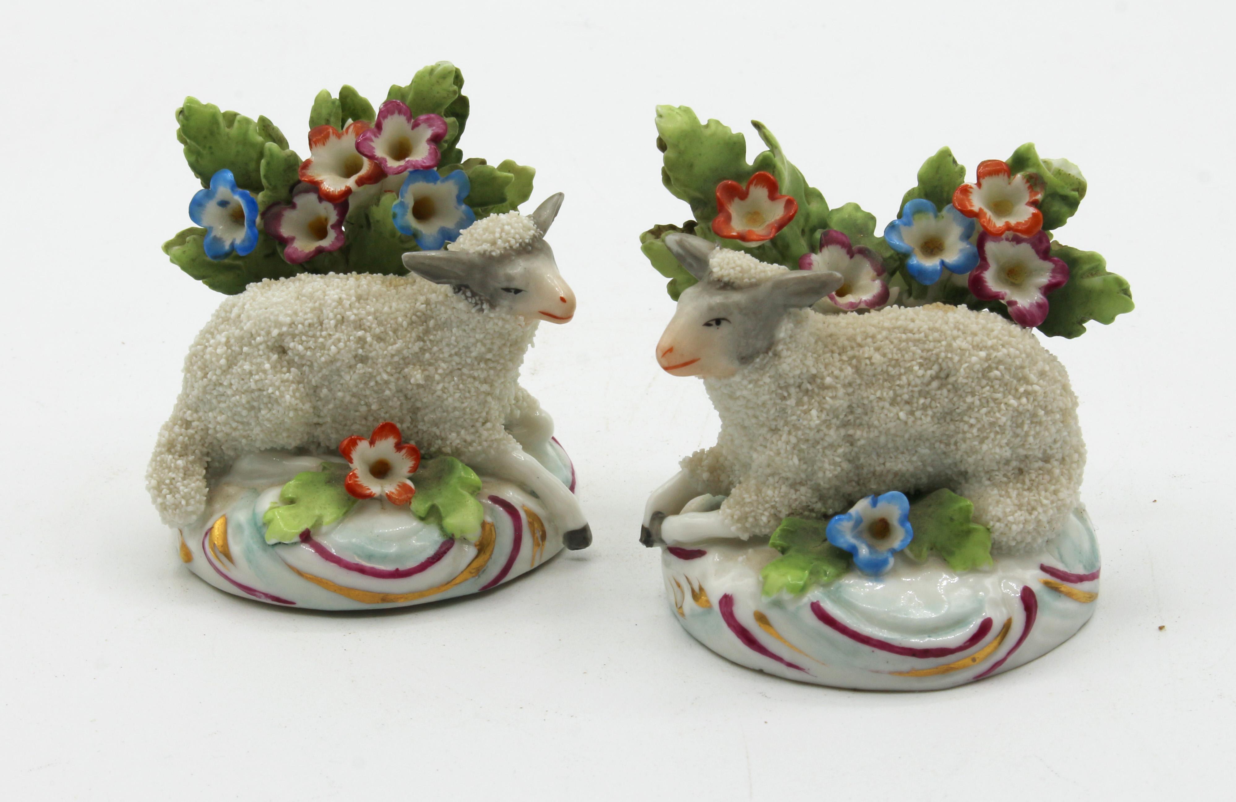 Pair of recumbent sheep with bocages. By Samson, one with fake Chelsea gold anchor mark. c.1900, Paris. Hard paste porcelain. Made to fool the Grand Tour buyer. These retain a dealer label as Chelsea, c.1770! Minor losses. 2 1/2