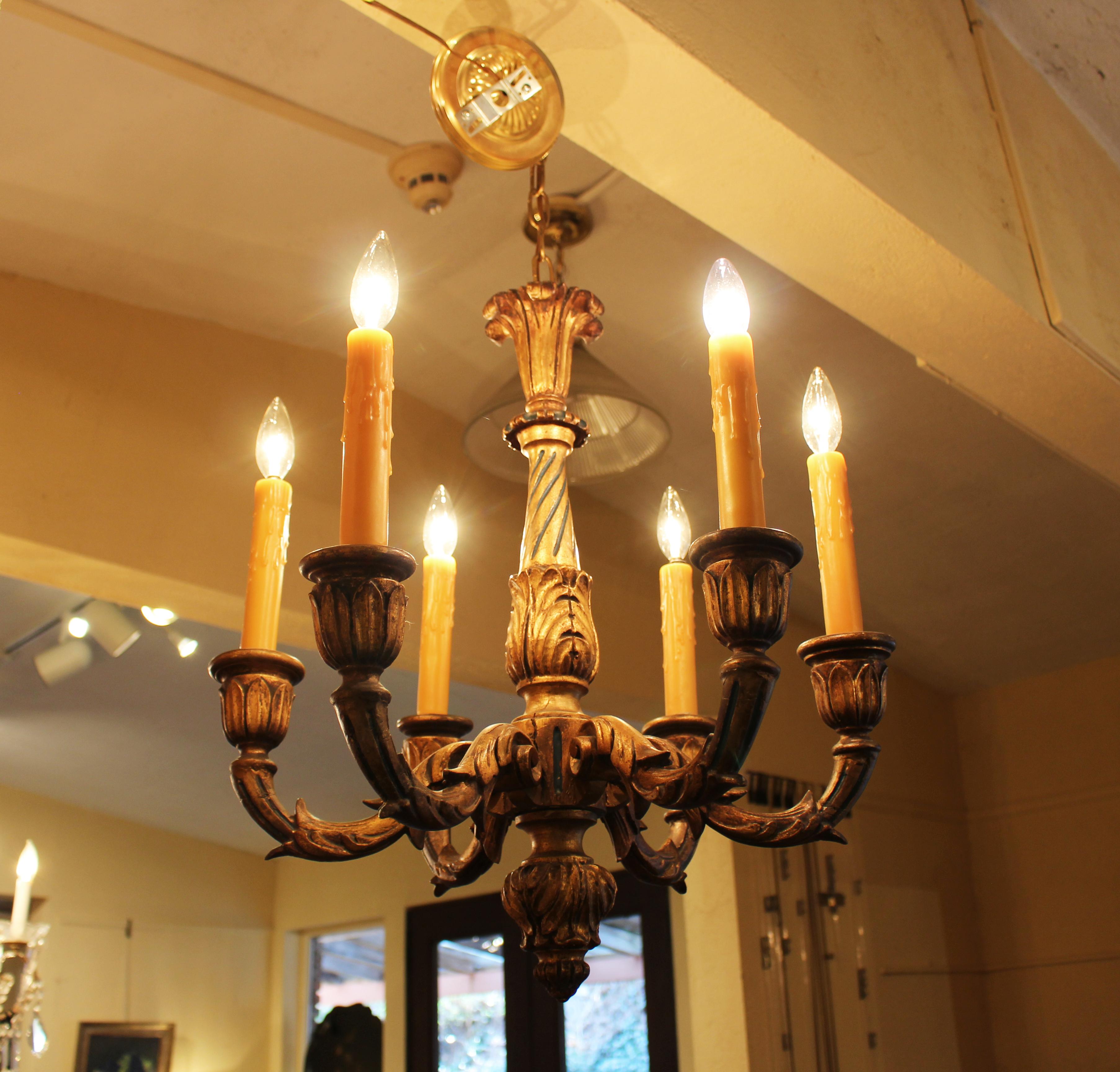 Circa 1900 6-light chandelier - guilt and blue accented carved wood. Probably French, in Renaissance revival style. Acquired by Albert Hadley for 1060 Fifth Ave, NYC. 20 3/4