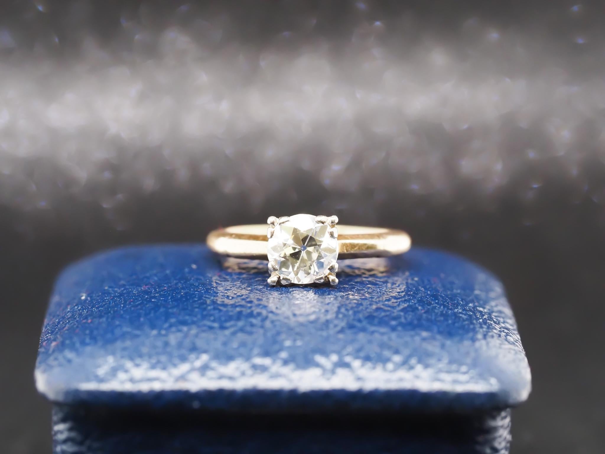 Year: 1900s

Item Details:
Ring Size: 4 (Sizable)
Metal Type: 14K Yellow Gold and White Gold Head [Hallmarked, and Tested]
Weight: 2.2 grams

Diamond Details: .90ct, Old European Brilliant, K Color, VS Clarity, 6.2mm

Band Width: 1.6mm
Condition: