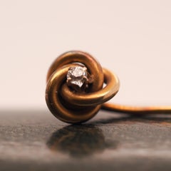 Circa 1900s 14K Yellow Gold and Diamond Knot Stick Pin