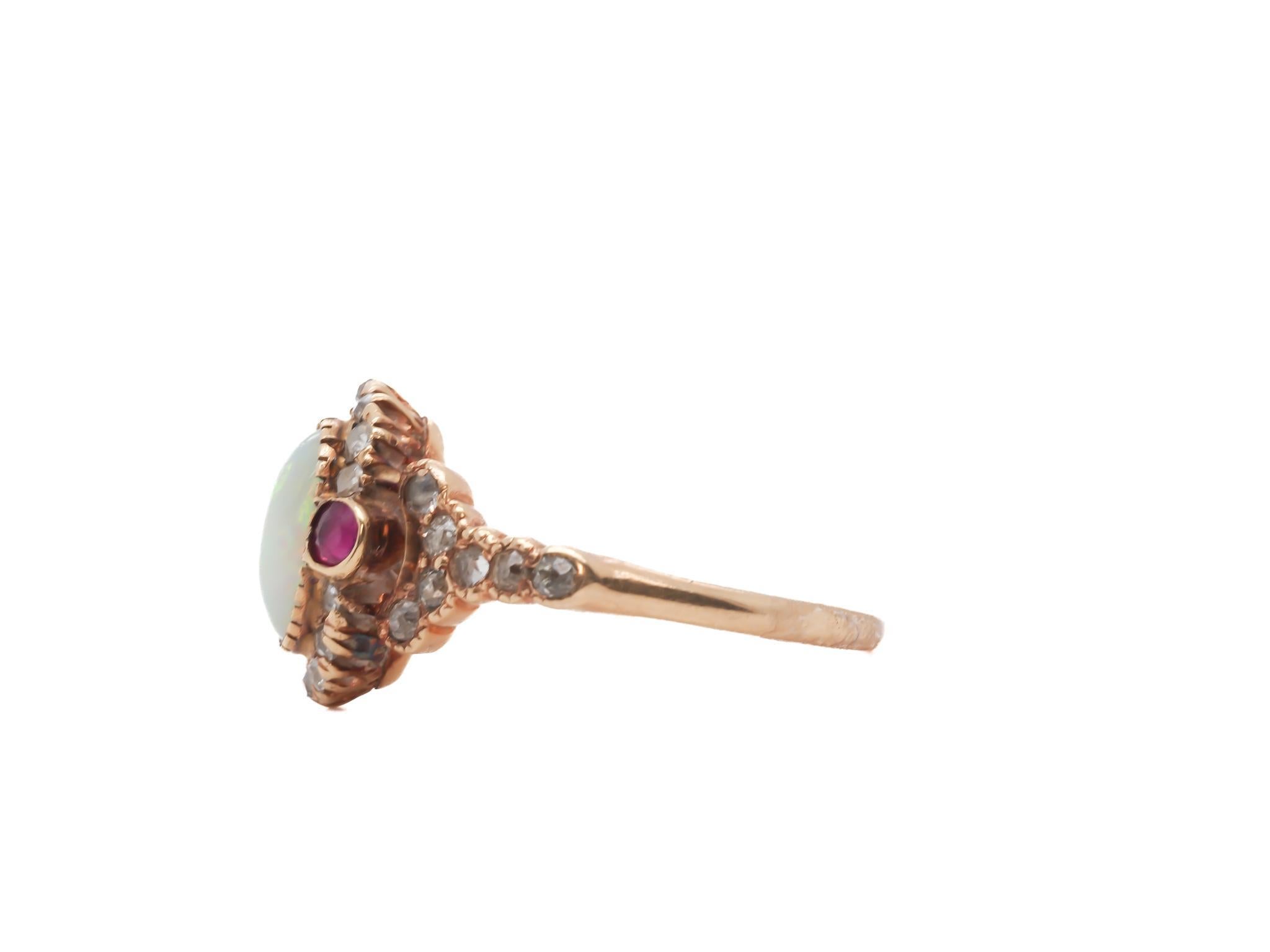 Taglio ovale Circa 1900s 14K Yellow Gold Opal, Ruby, and Old Mine Diamond Ring in vendita