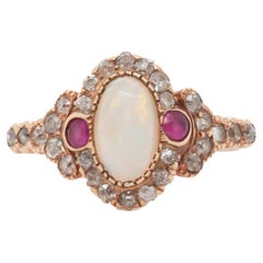 Circa 1900s 14K Yellow Gold Opal, Ruby, and Old Mine Diamond Ring