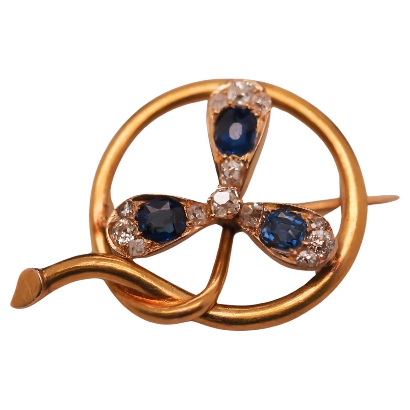 Circa 1900s 14K Yellow Gold Sapphire and Diamond Flower Brooch For Sale