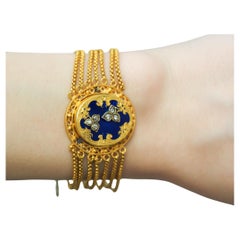 Antique Circa 1900s 18 Karat Yellow Gold Enamel and Diamond Secret Locket Bracelet
