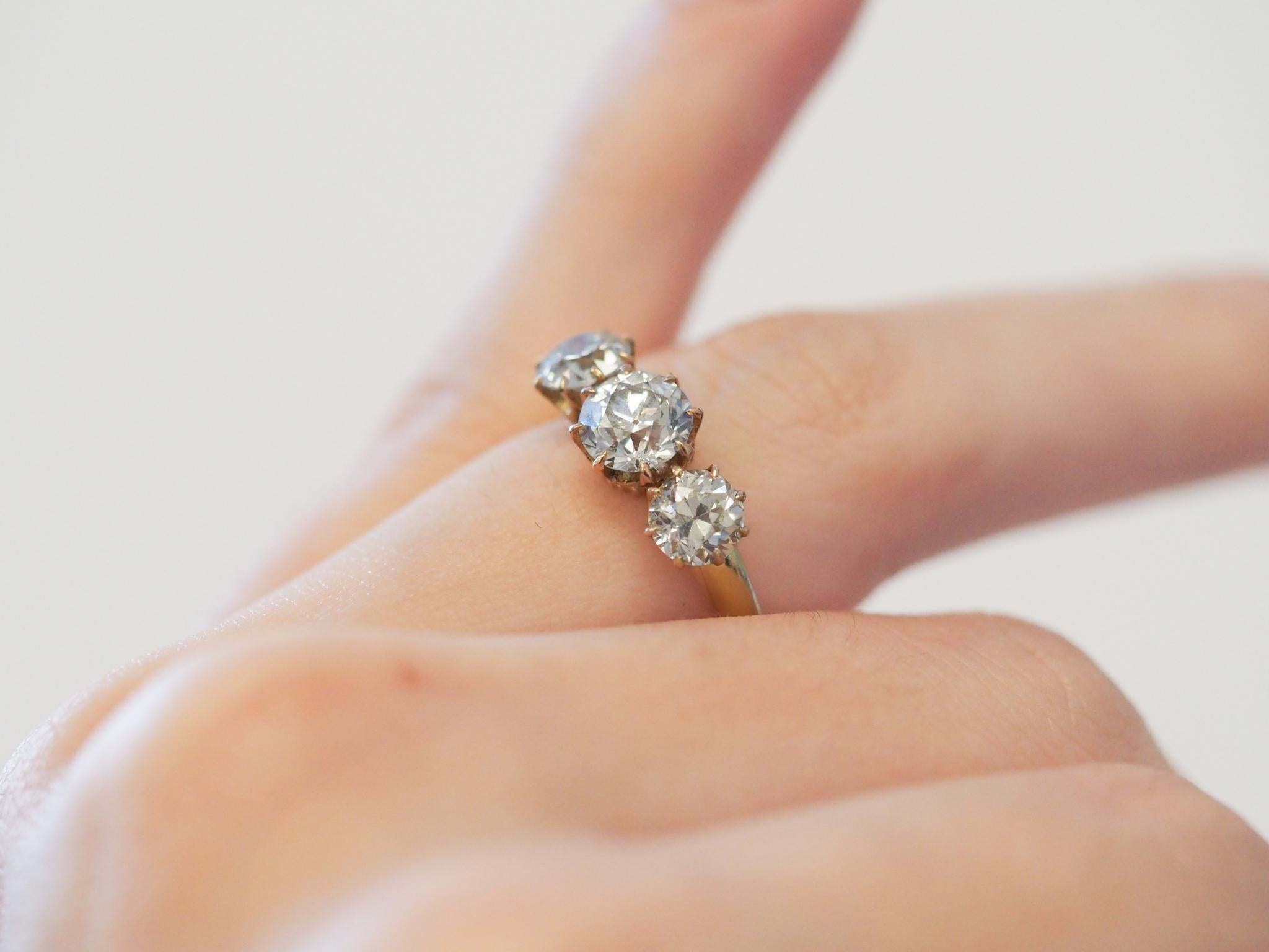 Women's Circa 1900s Center 1.00ct GIA Old European Three Stone Diamond Engagement Ring For Sale