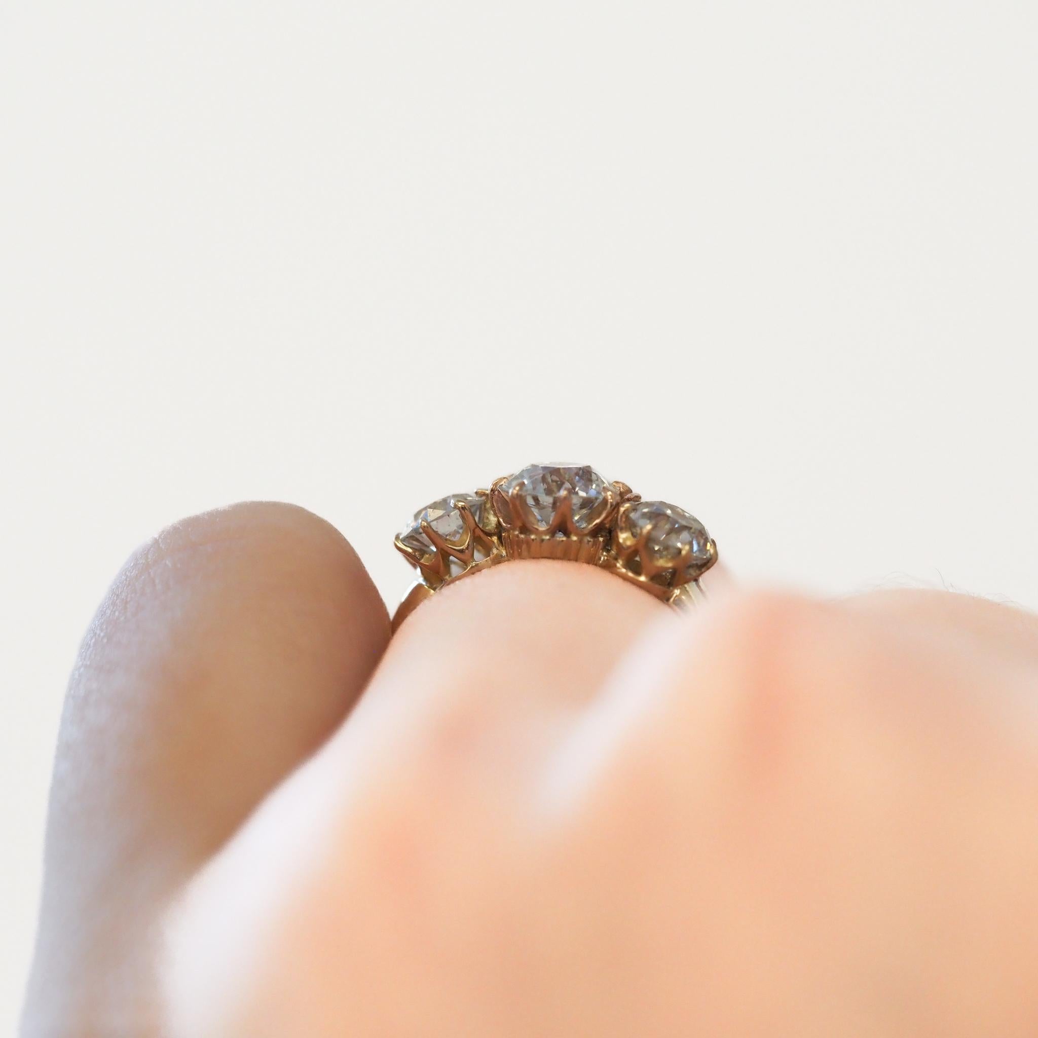 Circa 1900s Center 1.00ct GIA Old European Three Stone Diamond Engagement Ring For Sale 1
