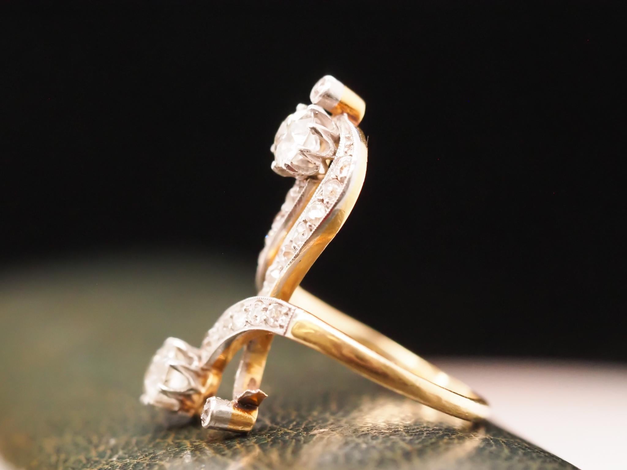 Women's Circa 1900s Edwardian 14K Yellow Gold and Platinum Crossover Ring For Sale