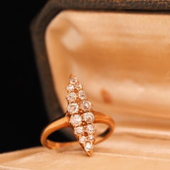Circa 1900s Edwardian 18K Yellow Gold Navette Ring with Old Mine Diamonds