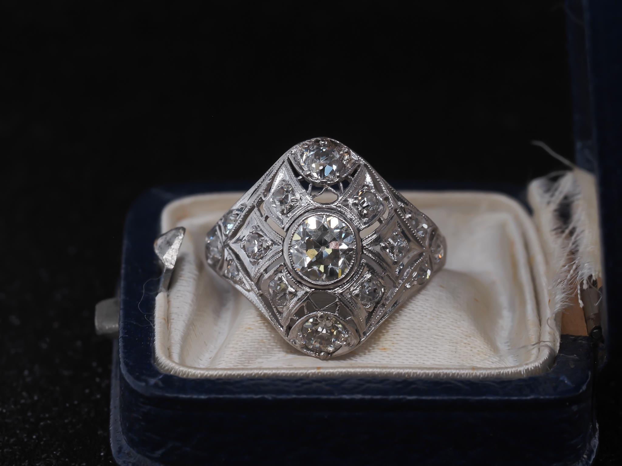 Year: 1900s

Item Details:
Ring Size: 8.75 (Sizable)
Metal Type: Platinum [Hallmarked, and Tested]
Weight: 4.8 grams

Center Diamond Details: .85ct, Old European Brilliant, I color, VS Clarity.

Side Stone Details: .50ct total weight, Old European