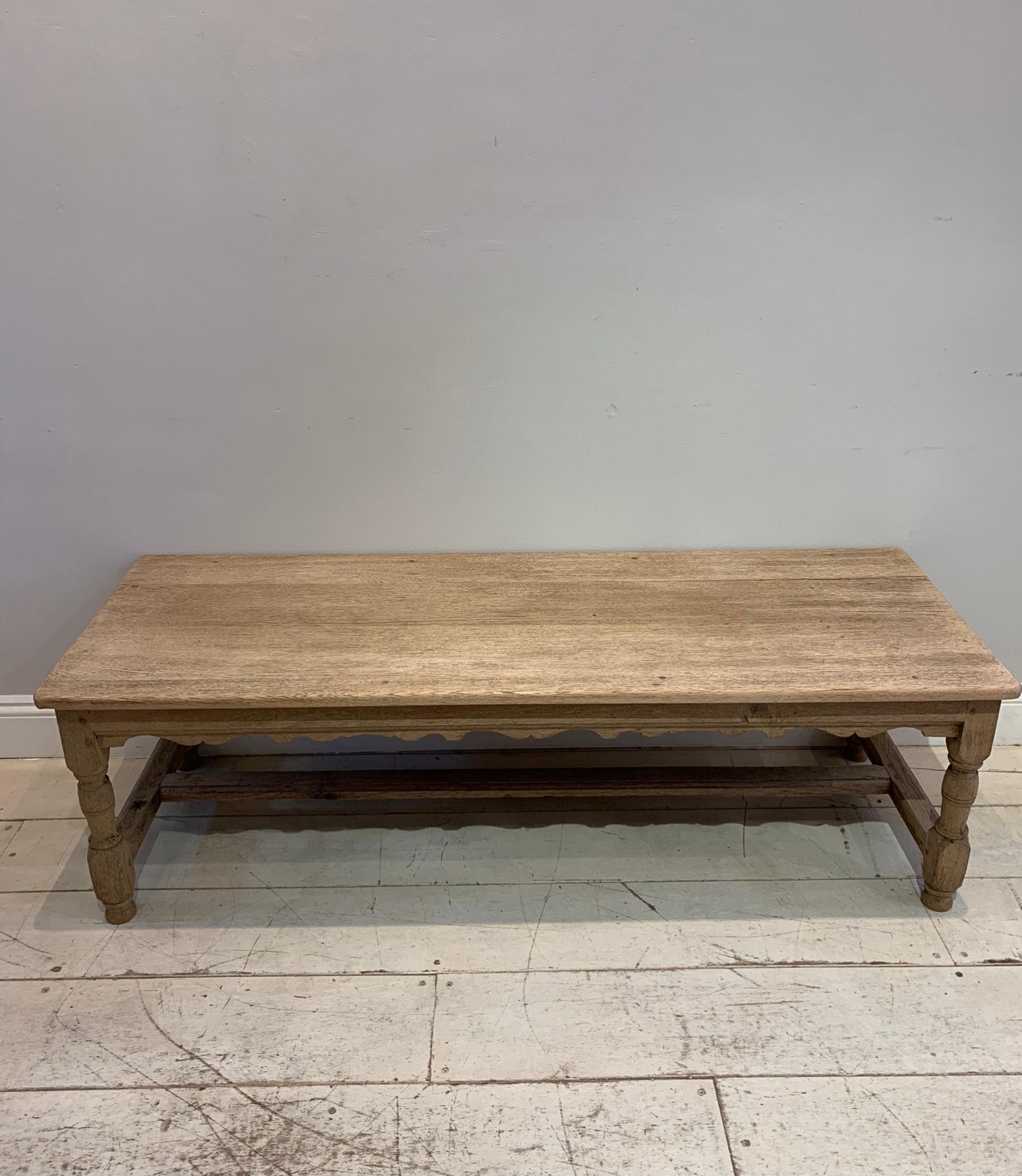 A very useful bleached oak bench from the early 1900s.
Sturdy and strong in an understated style. Perfect for a coffee table or perhaps with a long cushion creating a window seat or just simply a hall bench.

Please note that the fretwork is only