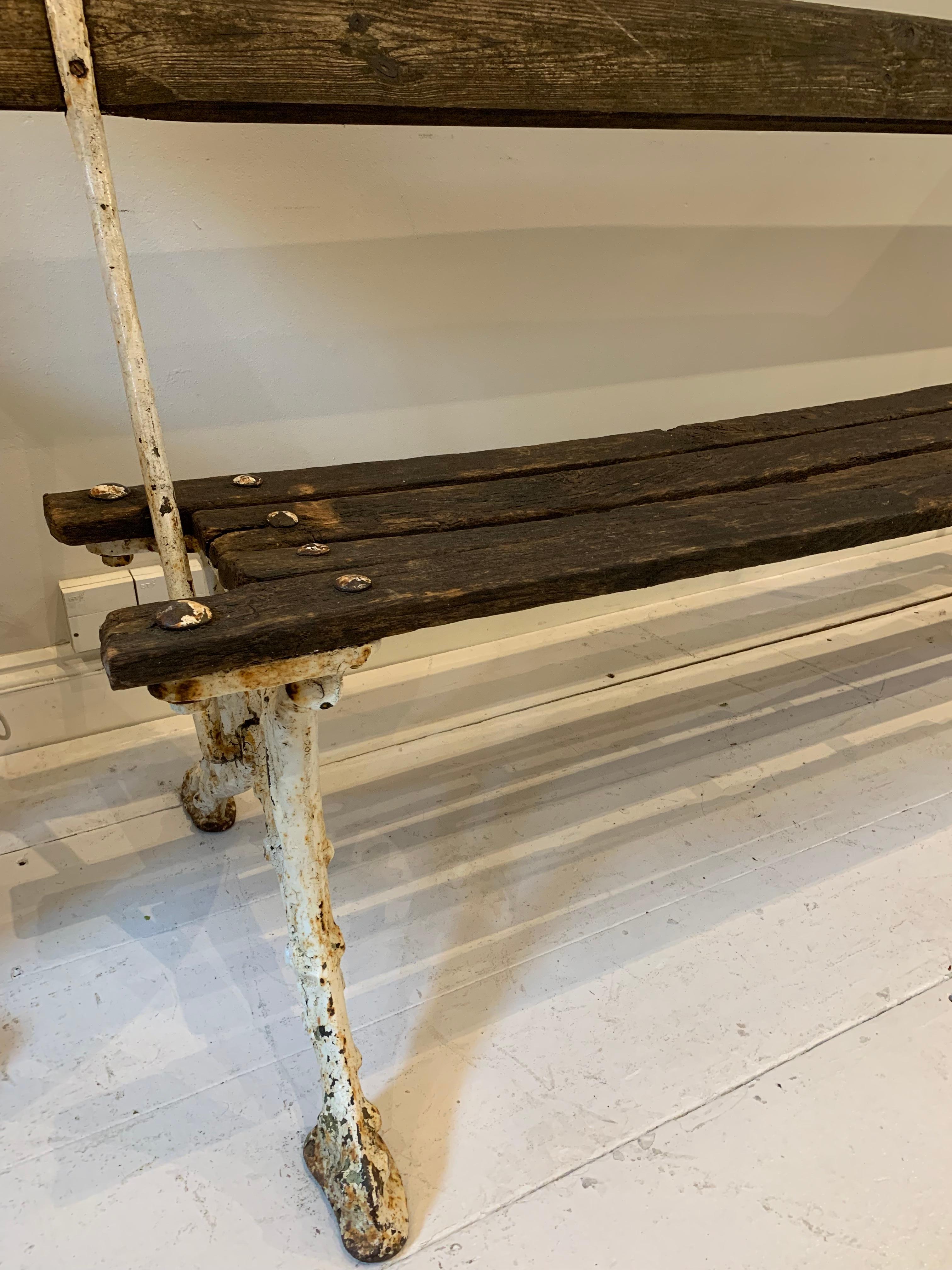 A French painted cast iron faux bois garden bench.
Sturdy with weathered planked wooden seat this decorative bench has a removable and reversible back.
Great for conversation and tanning.