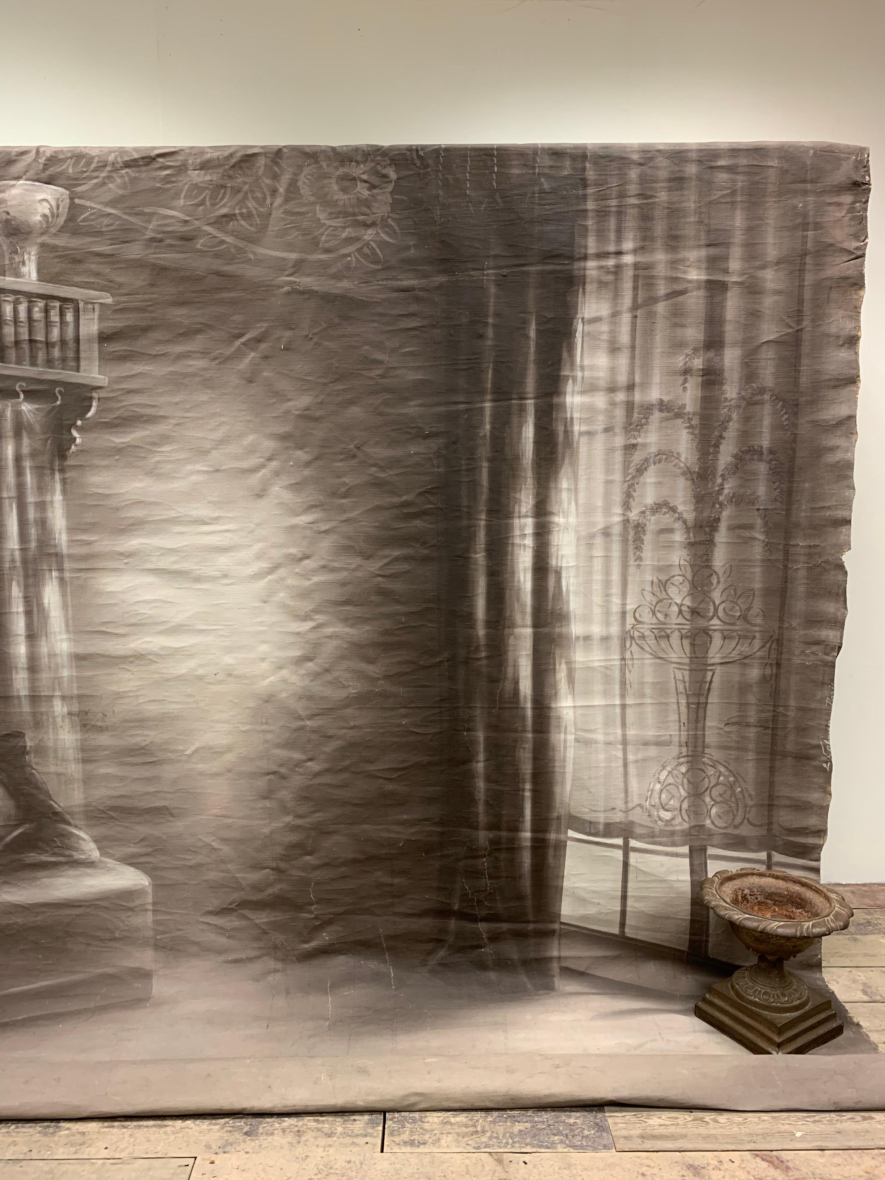 A large scale photographer's canvas back drop in dark sepia colour of an interior scene.
It is French and from the early 1900s and would make a great feature wall.
