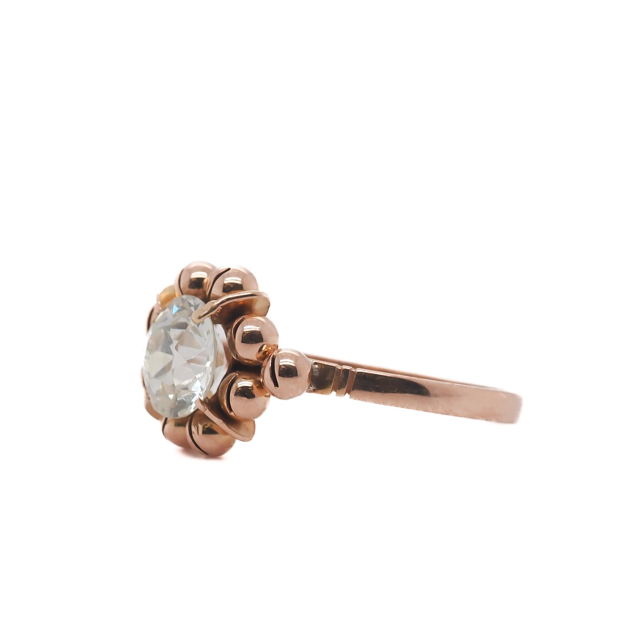 Year: 1900s

Item Details:
Ring Size: 8.5
Metal Type: 14K Rose Gold [Hallmarked, and Tested]
Weight: 2.8 grams

Center Diamond Details:

GIA Report#: 5234346257
Weight: 1.59ct total weight
Cut: Old European brilliant
Color: L
Clarity: VS2
Type: