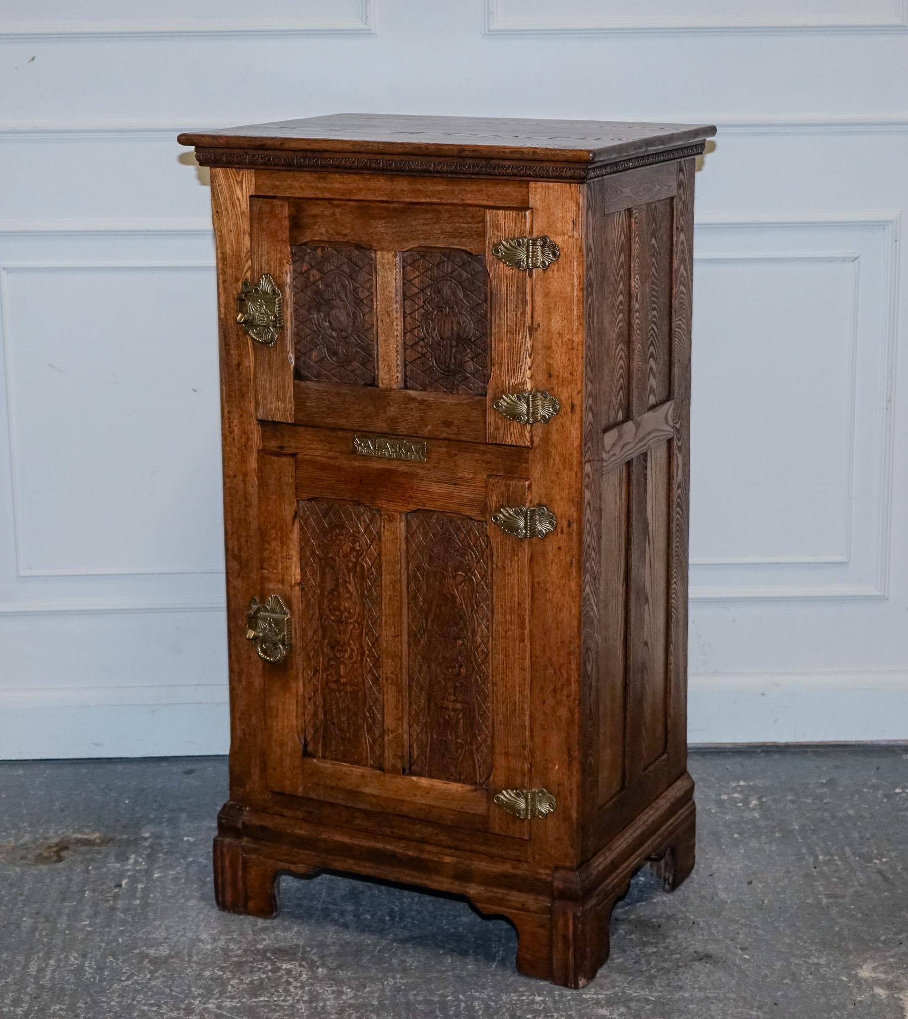 
We are delighted to offer for sale This icebox, crafted in the 1880s by the Alaskan Refrigerator Company, which hails from Muskegon, Michigan. It features two original doors adorned with cast brass hinges and door catches. 

The interior is lined