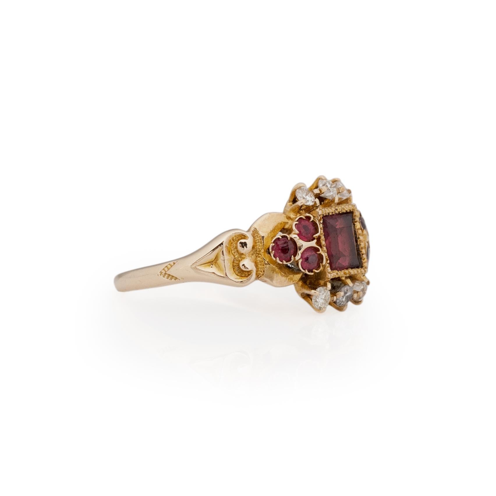 This Victorian beauty is fit for a queen. Crafted in 10K yellow gold, this beauty has eye catching details and classic color. Heading up the tapered shanks are hand carved scroll work designs that resembles hearts. In the center is a square step cut
