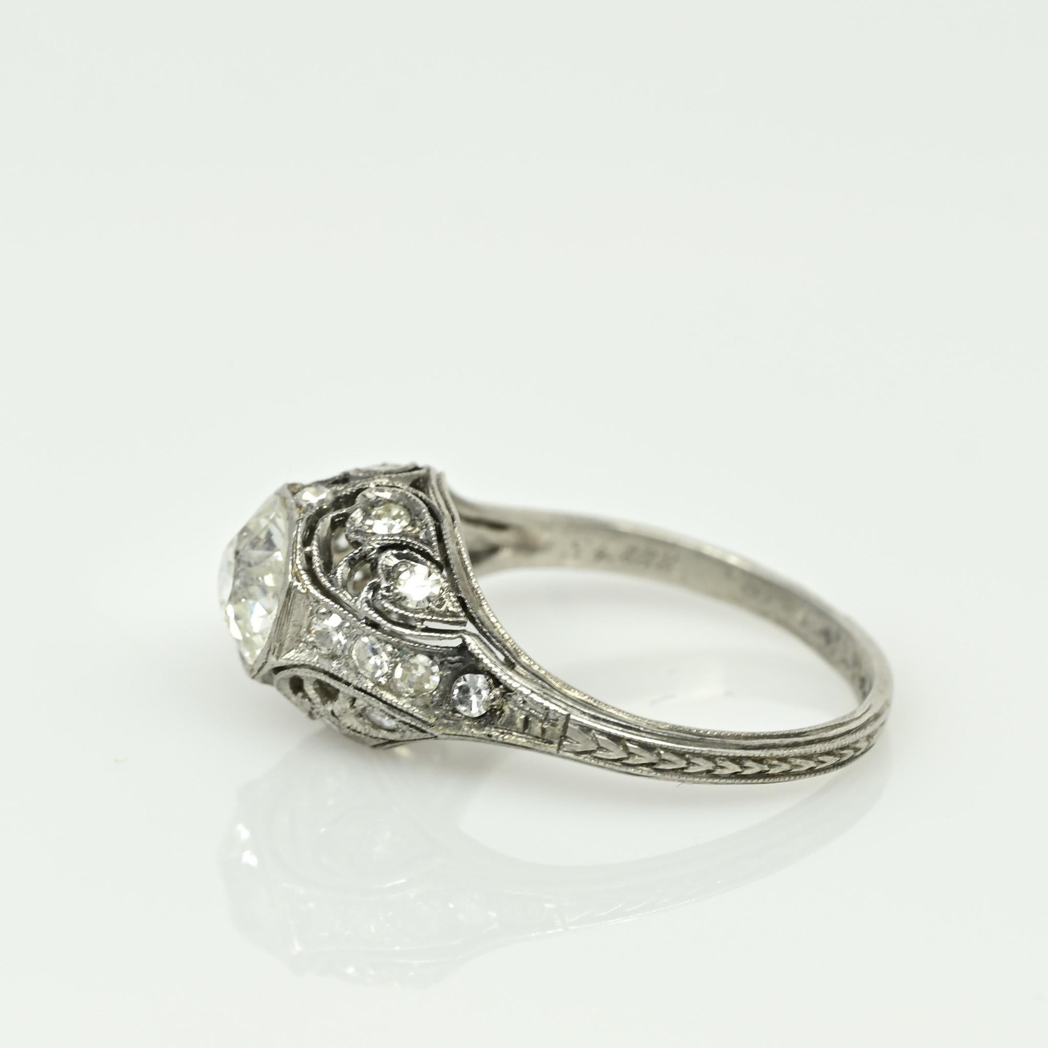 Circa 1901 Edwardian Platinum .98Ct Diamond Antique Filigree Engagement Ring In Good Condition In Addison, TX