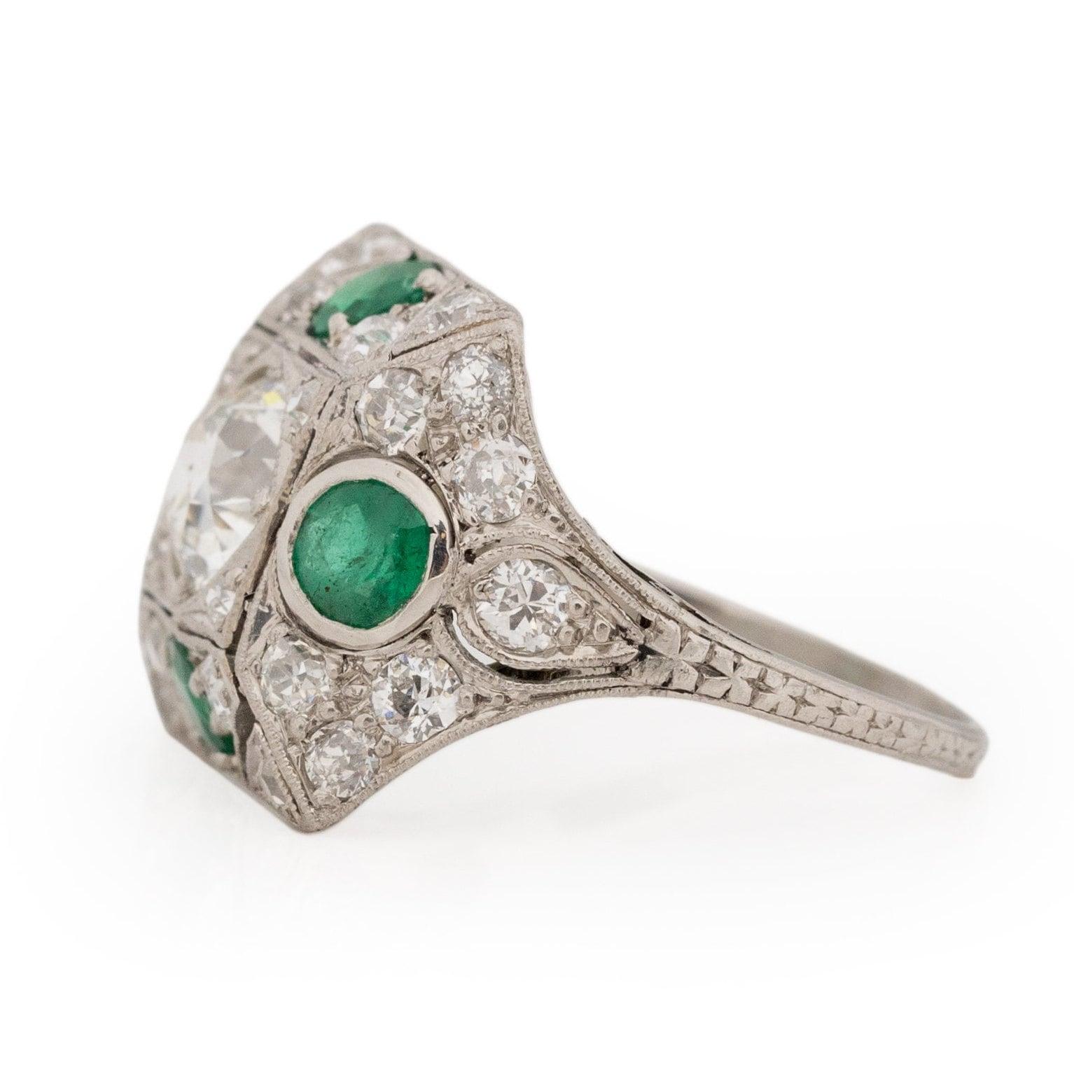 Circa 1901 Edwardian Platinum Old Mine Cut Center with Natural Emerald Accents For Sale 1