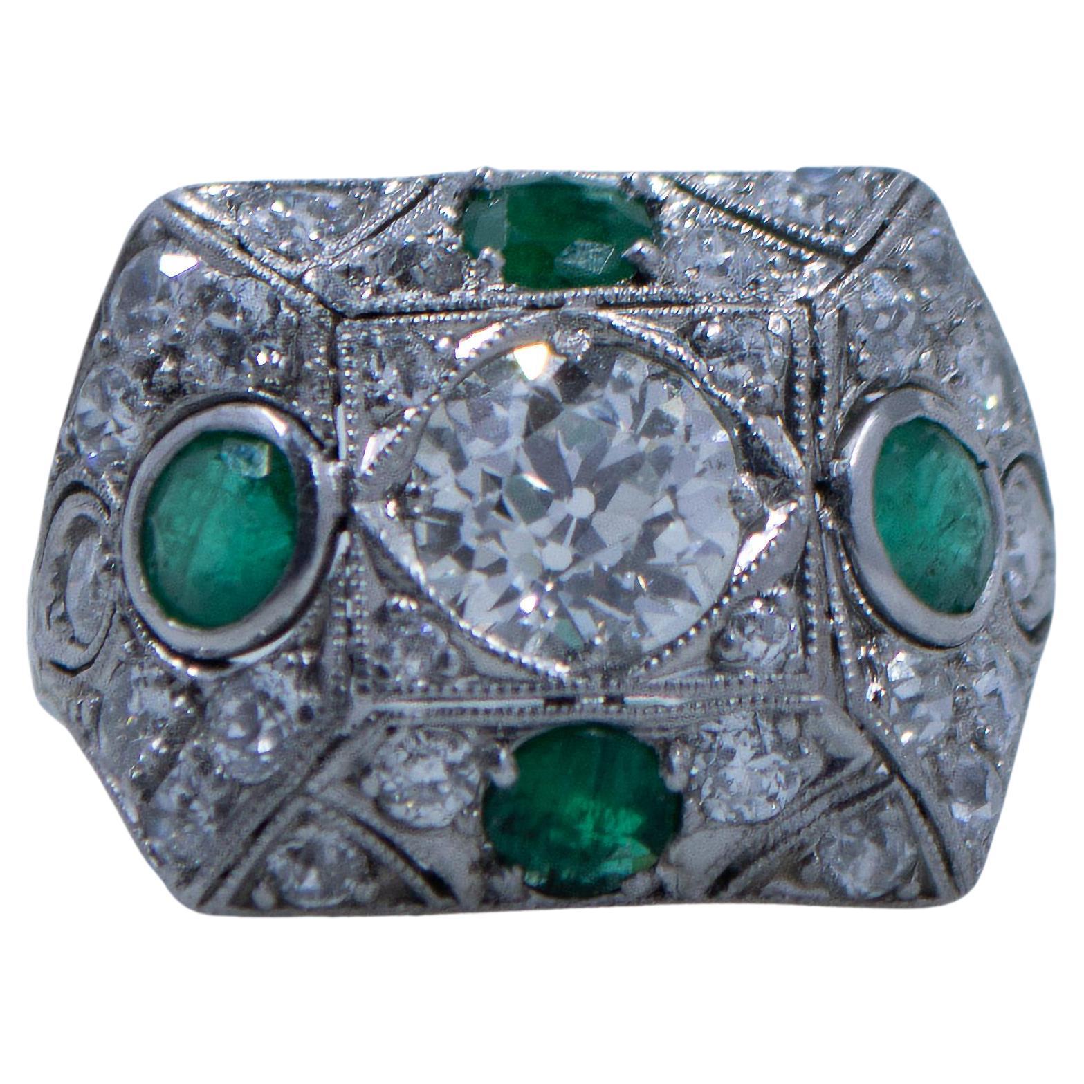 Circa 1901 Edwardian Platinum Old Mine Cut Center with Natural Emerald Accents For Sale