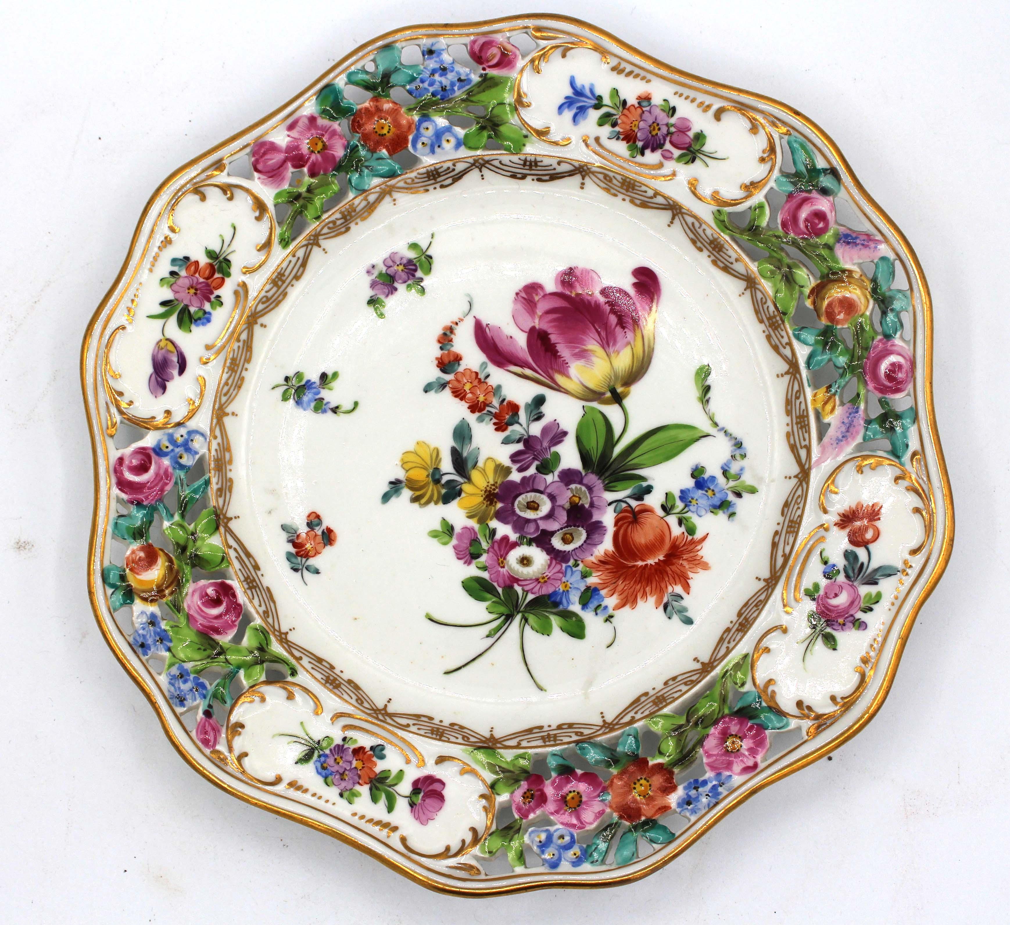 Circa 1902-1911 facing pair of reticulated porcelain dessert plates by Carl Thieme. With the SP mark for Saxony Porcelain and 