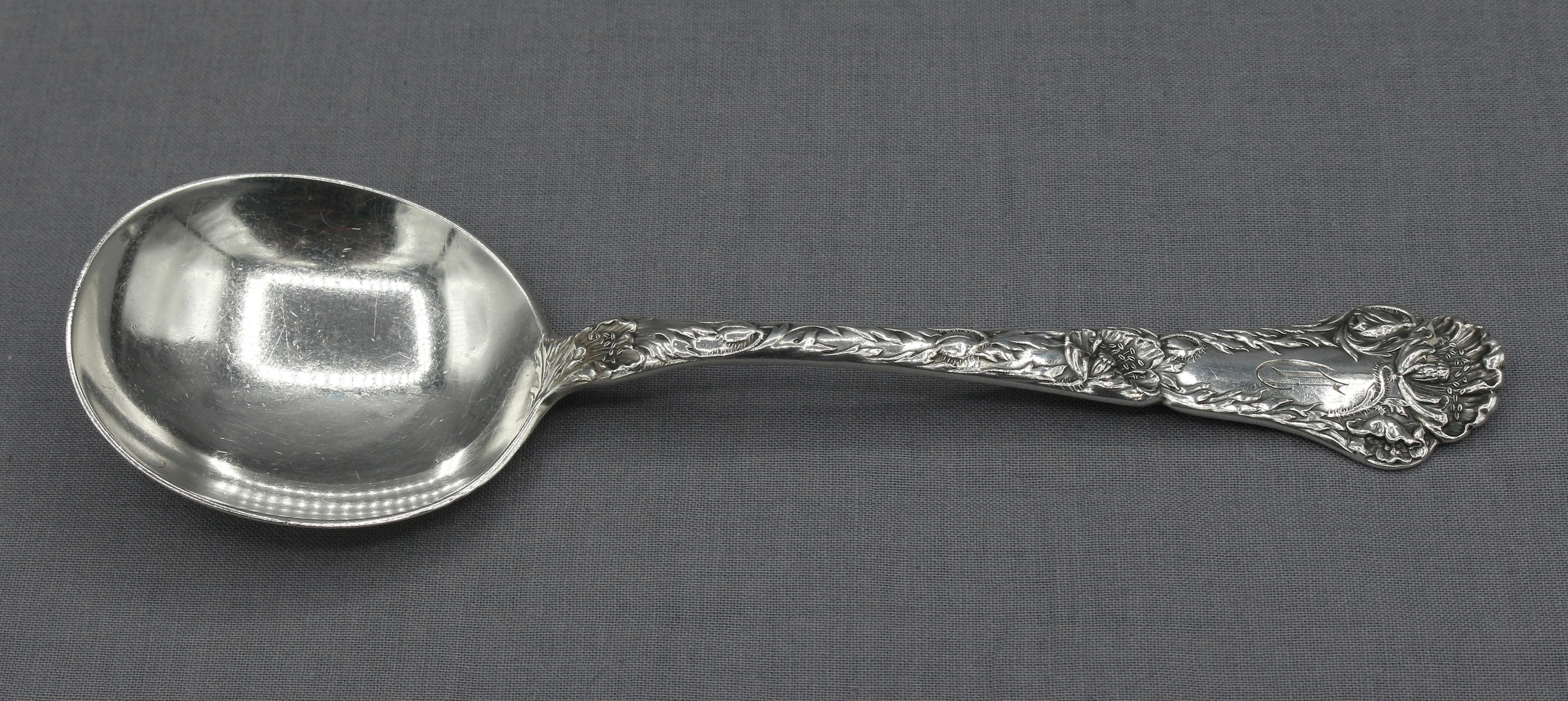 Set of 12 Art Nouveau sterling silver gumbo spoons by Gorham, c.1905-10. Poppy pattern of 1902. Monogram 