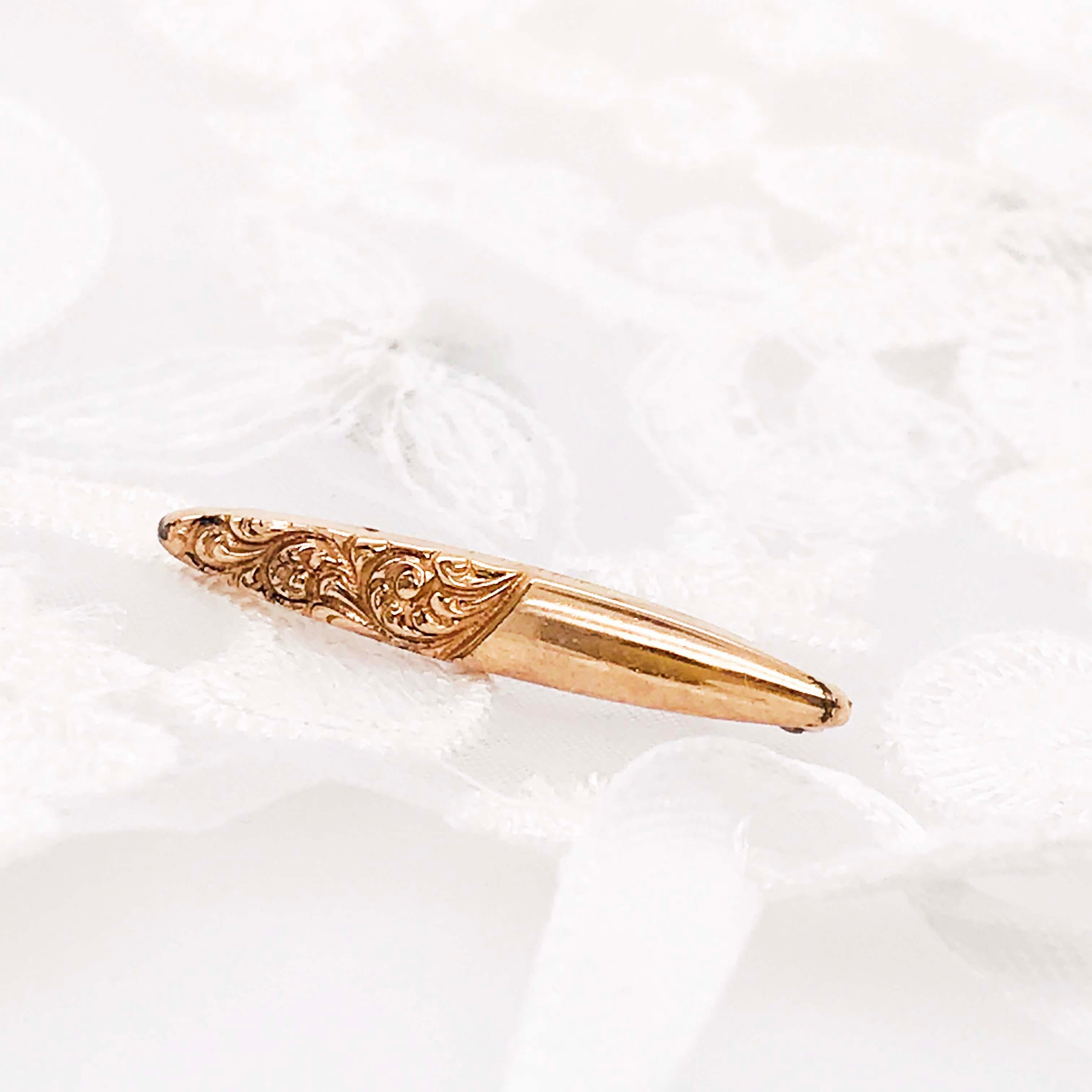 This Antique Rose Pin is so special. This one of a kind piece was handmade CIRCA 1910. The pin is lightweight and dainty, the perfect accessory for any outing! On this brooch, there is a delicate hand engraving that is very whimsical and adds