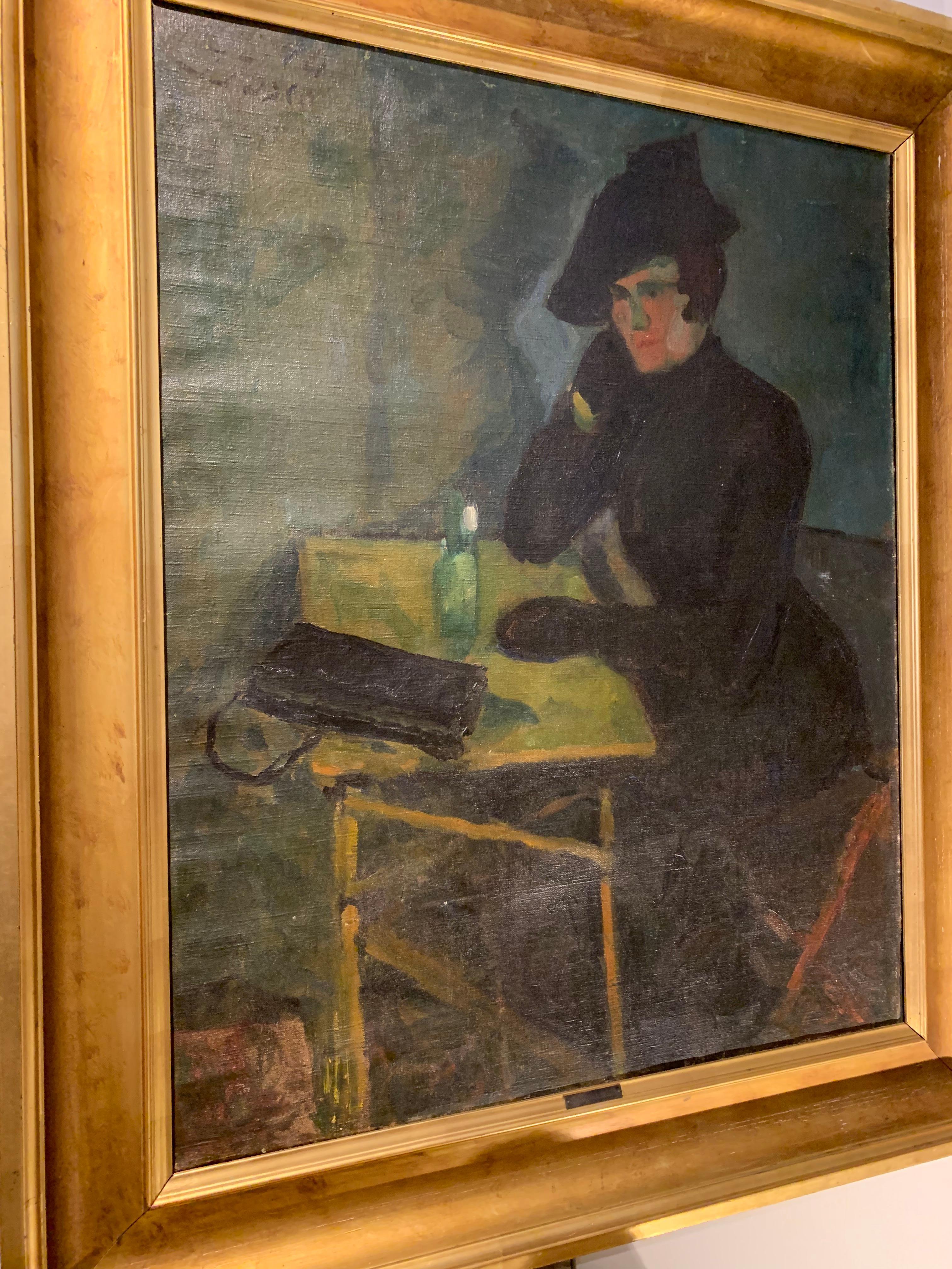 A striking deep framed oil painting on canvas of a Lady formally dressed in black seated at a table with a blue background.

The artist Immanuel Ibsen (1887-1944) was a Danish impressionist and modern painter.

Believed to have been hung in