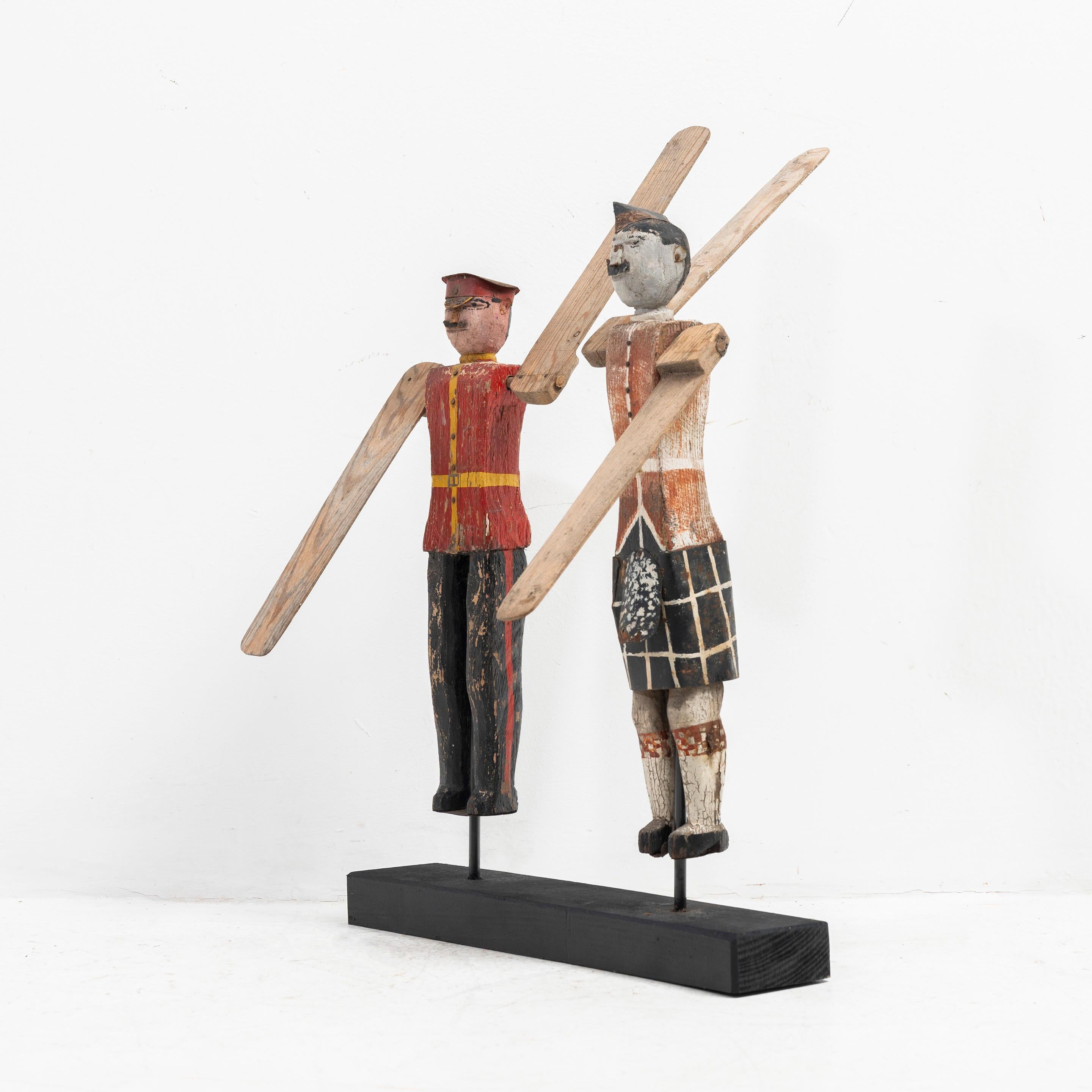 Two folk art whirligigs: Army Offiers; one with a kilt and sporran.
England circa 1910
Measurements: H: 40cm (15.7