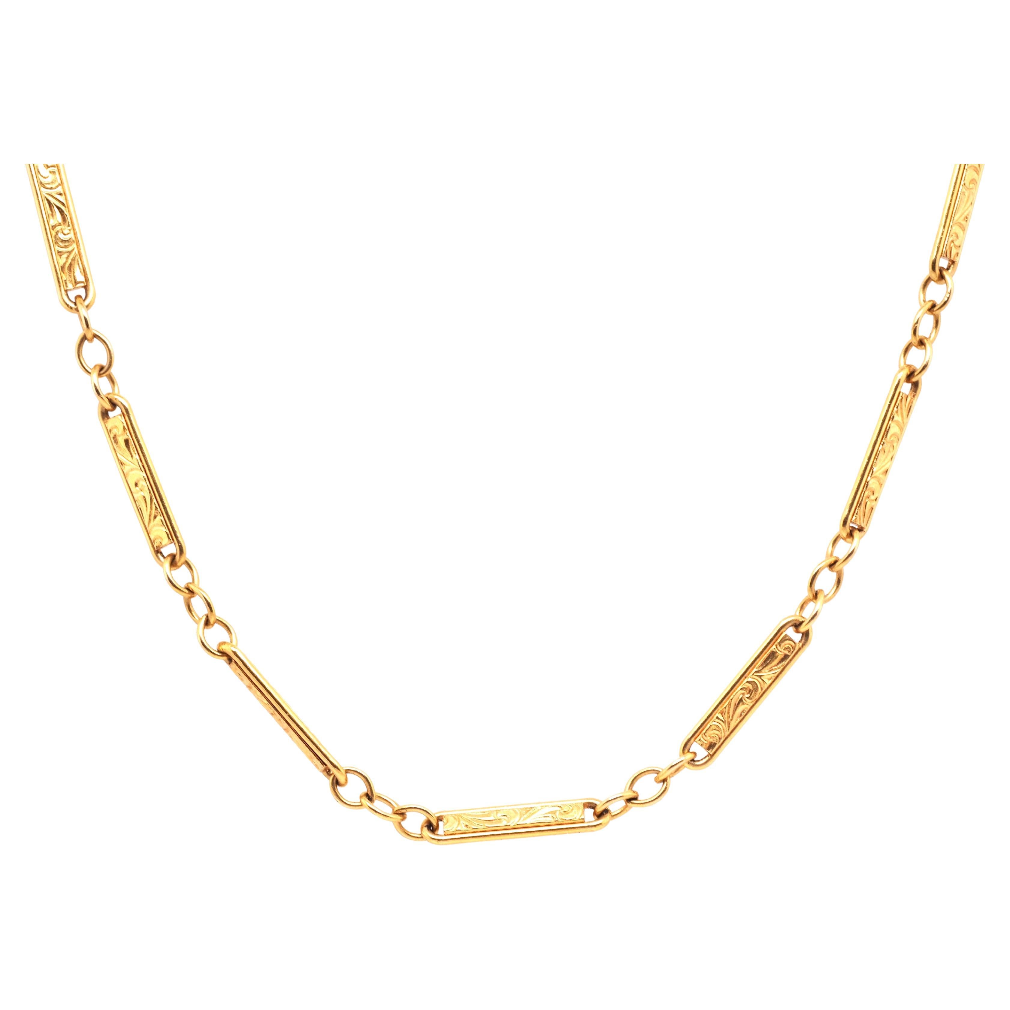 Circa 1910s Edwardian 14K Yellow Gold 26.5 Inch Engraved Link Necklace Chain For Sale