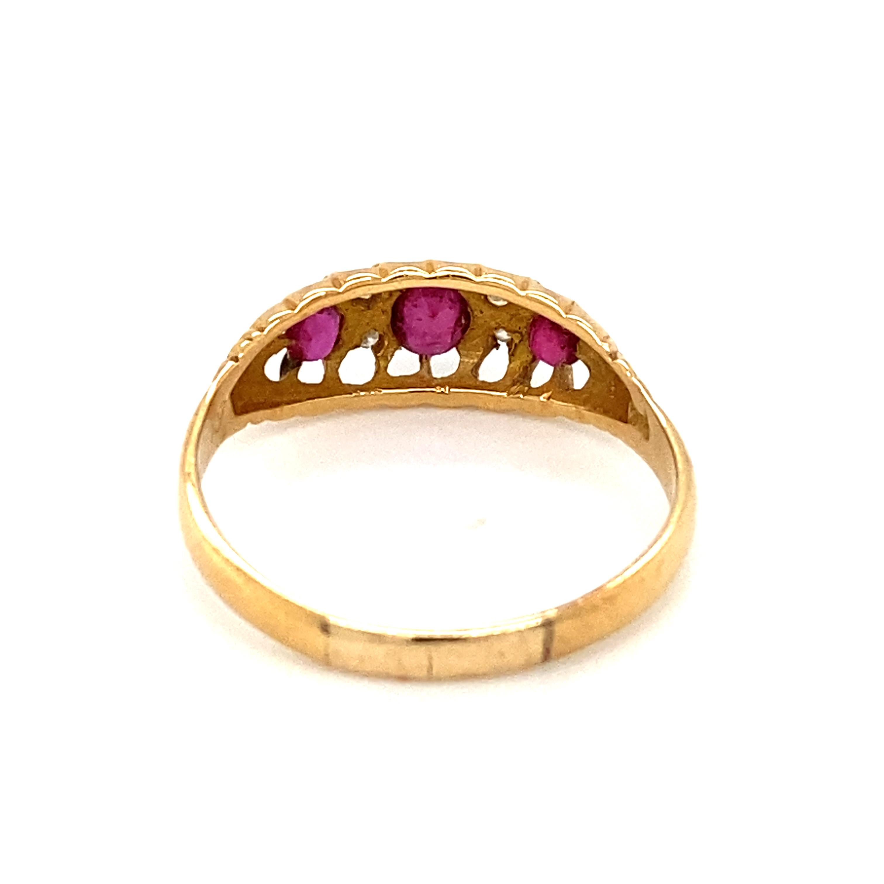 Item Details: This antique ring with oval rubies and accent diamonds is a beautiful Edwardian piece with many vintage motifs. With three bright red rubies, this ring is an excellent quality example of Edwardian design.

Circa: 1910s
Metal Type: 14k