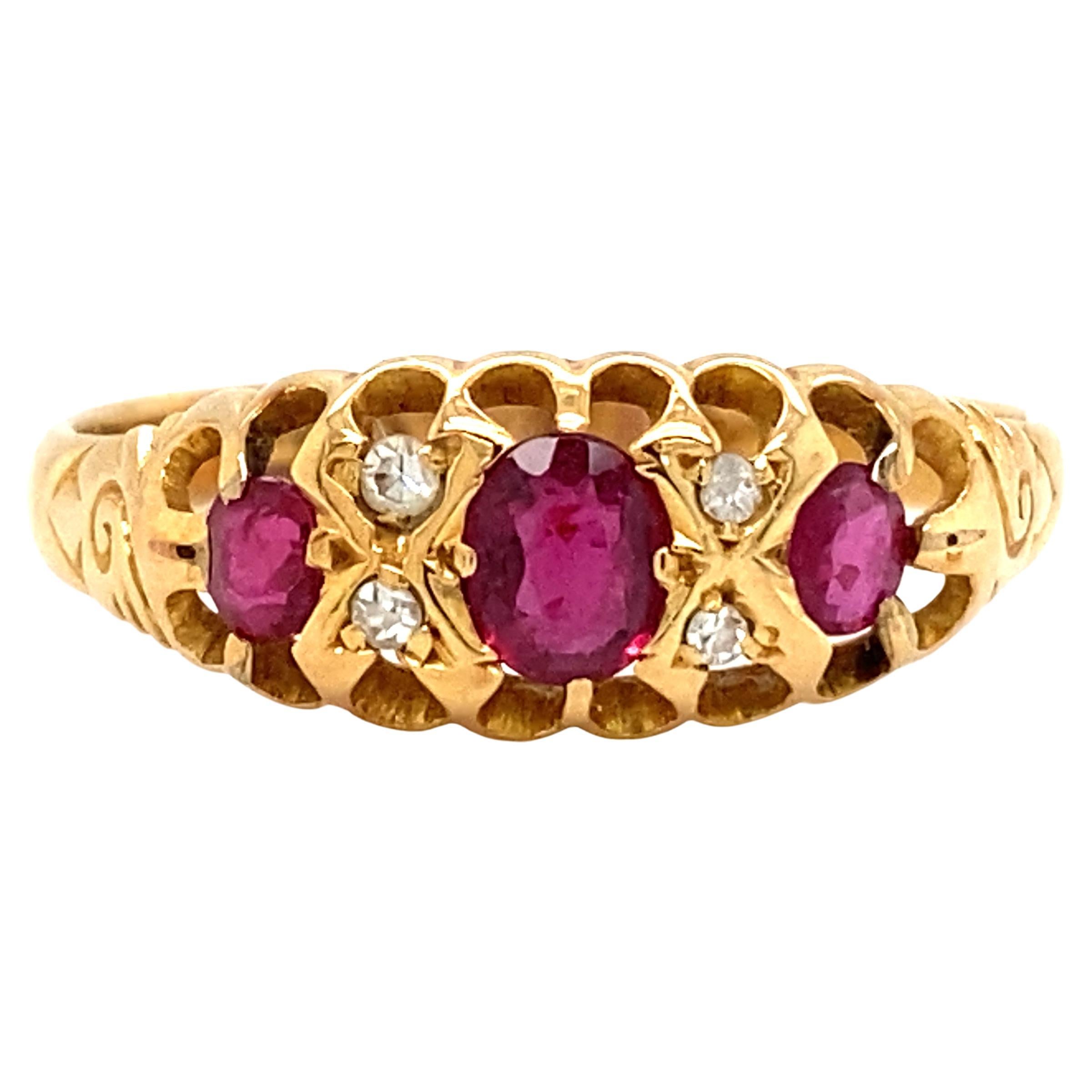 Circa 1910s Edwardian Oval Ruby and Diamond Ring in 14 Karat Yellow Gold