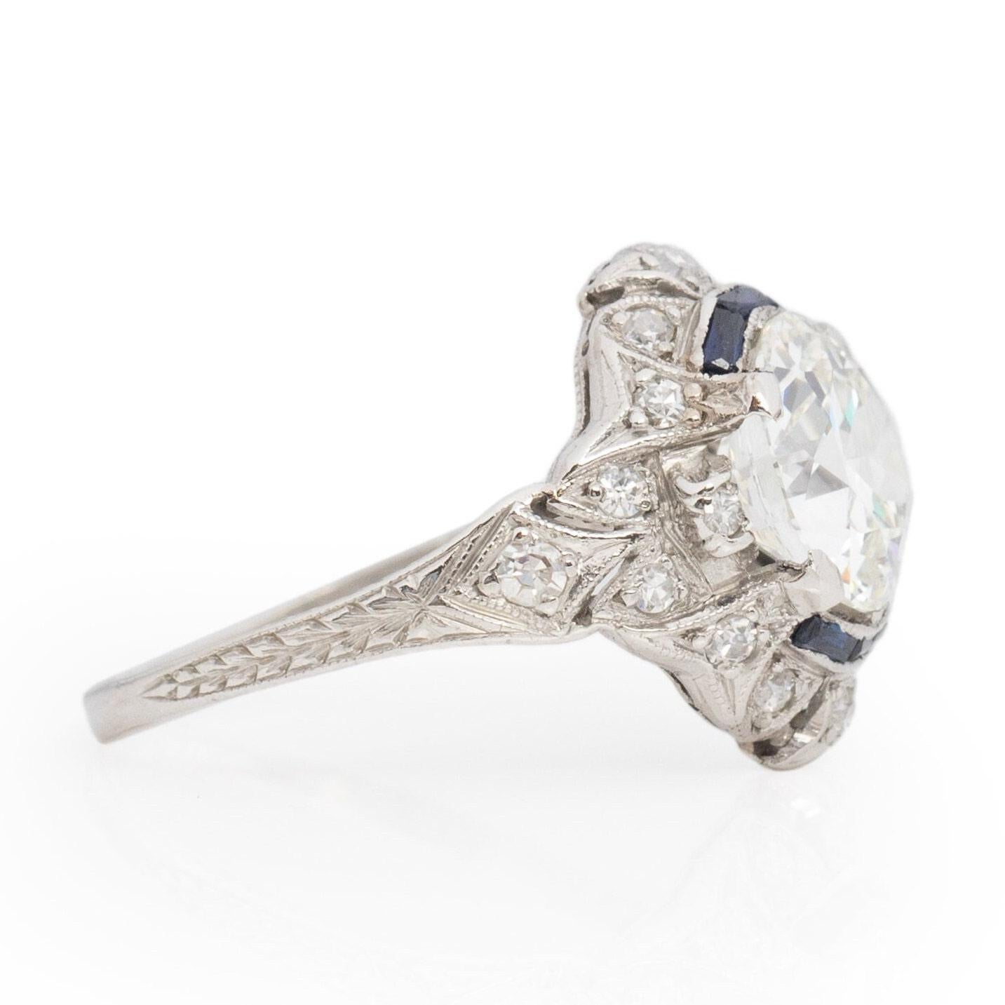 Circa 1910's Edwardian Platinum 2.34Ct Old European Cut Diamond & Sapphire Ring In Good Condition For Sale In Addison, TX