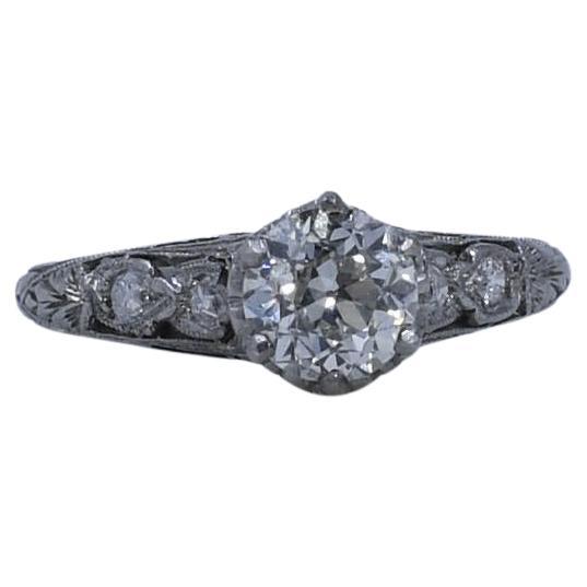 Circa 1910's Edwardian Platinum .93 ct Old European Cut Diamond Engagement Ring For Sale