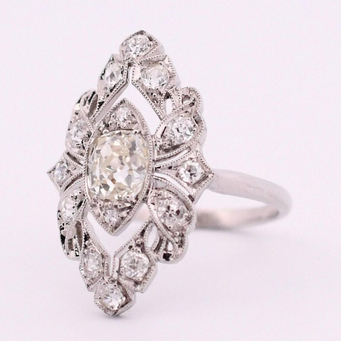 Circa 1910's Edwardian Platinum TRAUB Floral 1.02Ct Old Mine Cut Diamond Antique In Good Condition For Sale In Addison, TX