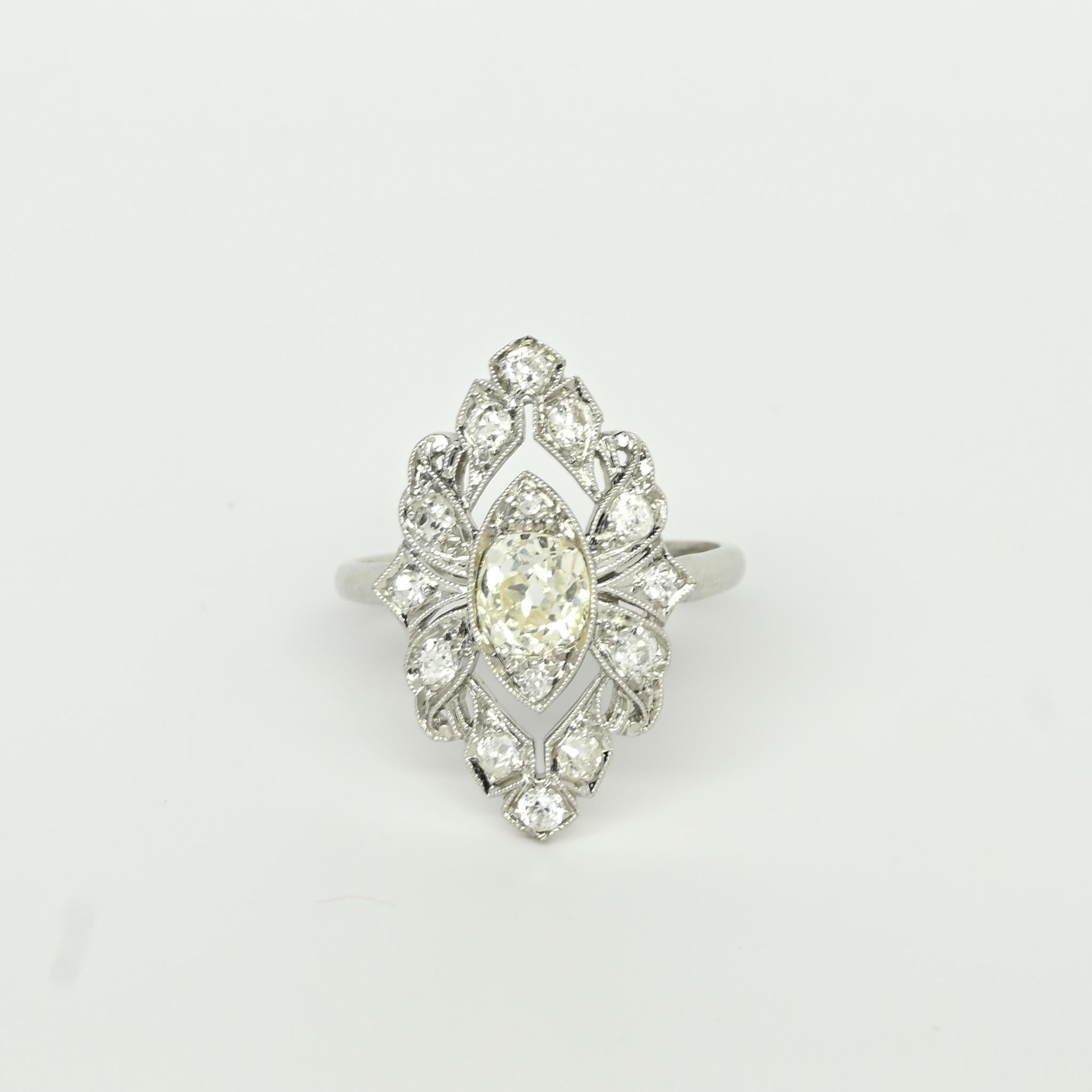 Circa 1910's Edwardian Platinum TRAUB Floral 1.02Ct Old Mine Cut Diamond Antique In Good Condition In Addison, TX