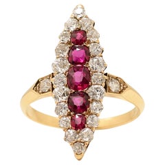 Circa 1910's Victorian 14K Yellow Gold Ruby and Diamond Vintage Navette Ring