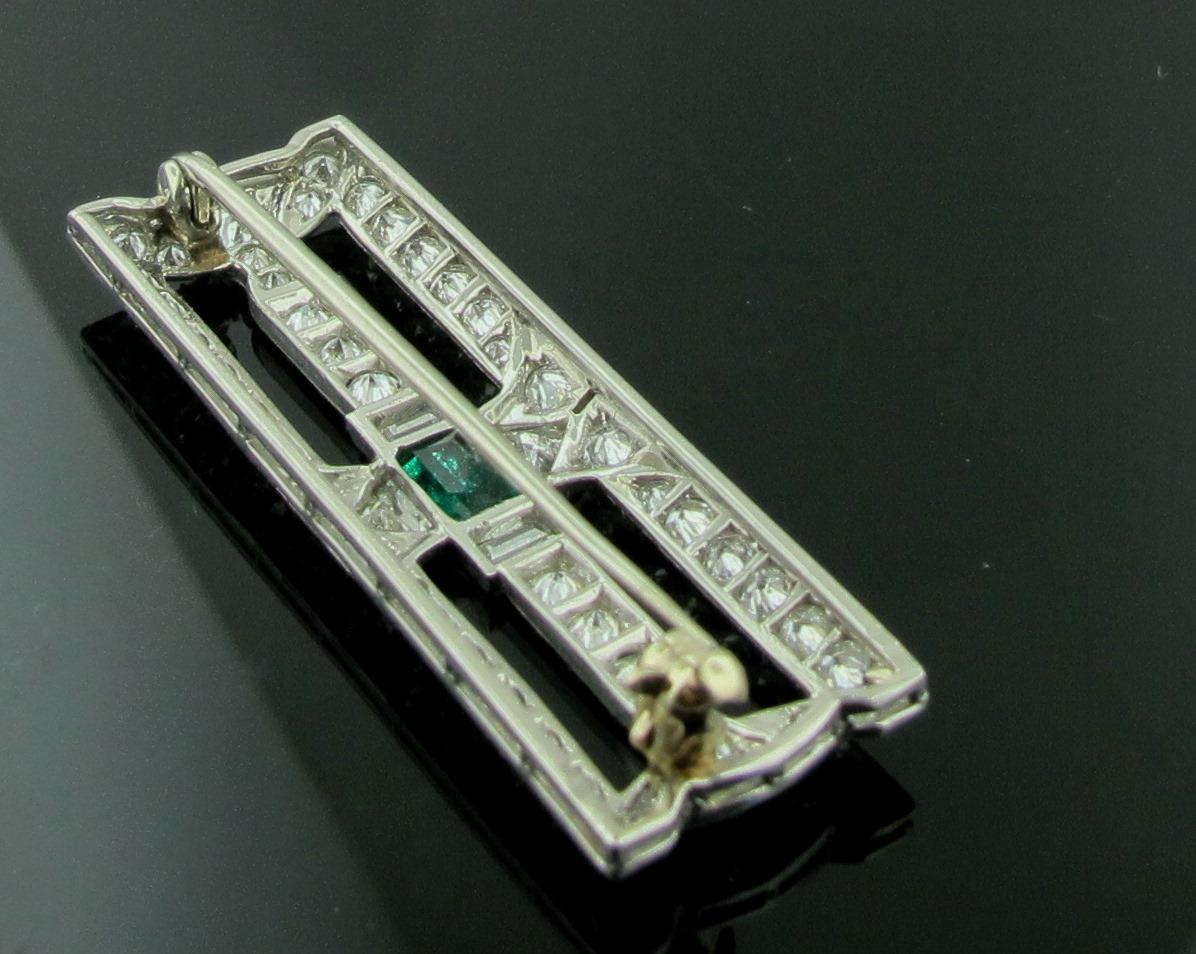Emerald Cut Art Deco Diamond and Emerald Brooch in Platinum, circa 1920 For Sale