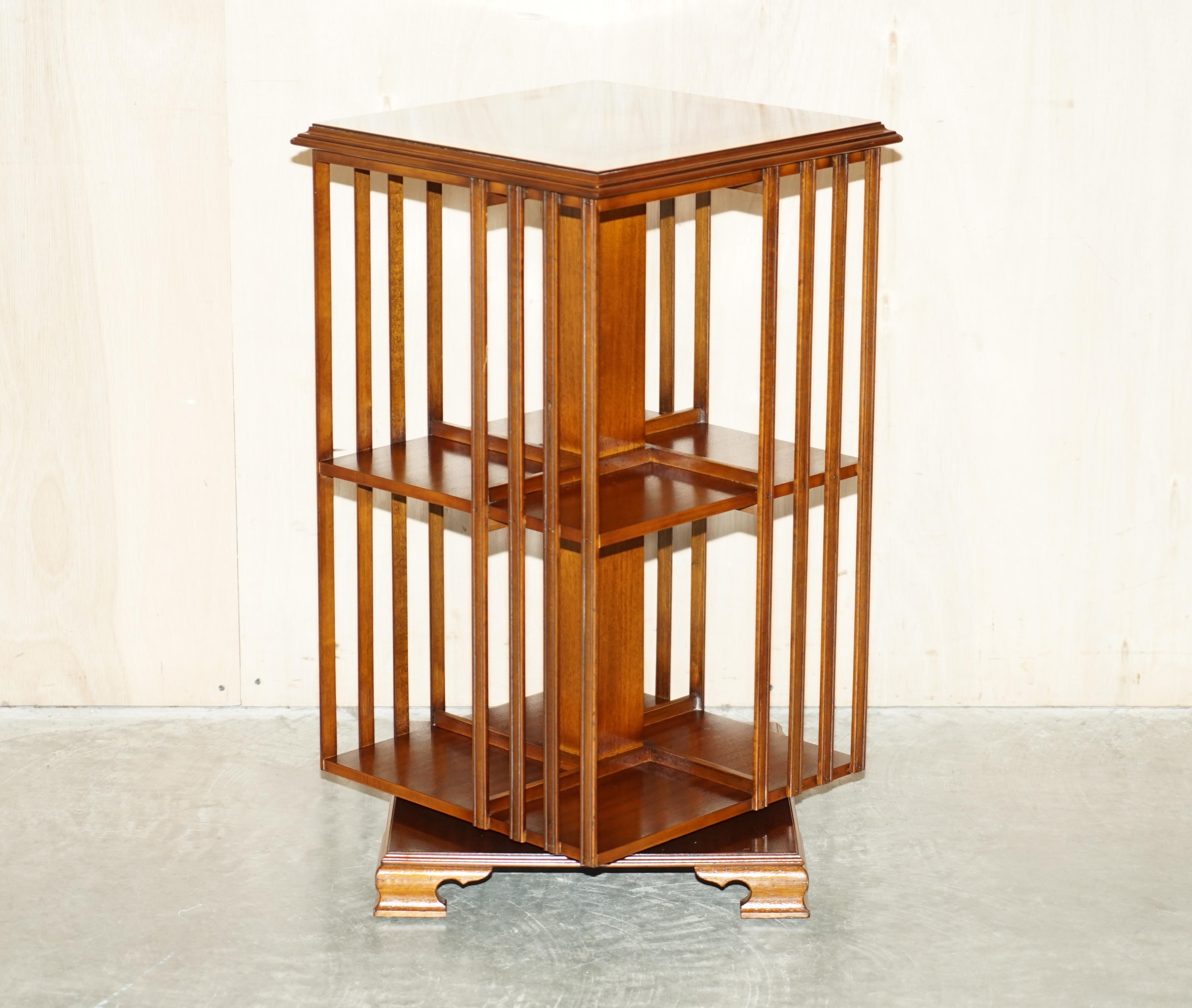 We are delighted to offer for sale this stunning circa 1920 Walnut & Satinwood revolving bookcase with Sheraton inlay to the top.

An exceptionally well made and highly decorative library bookcase. This is a very versatile piece of furniture that