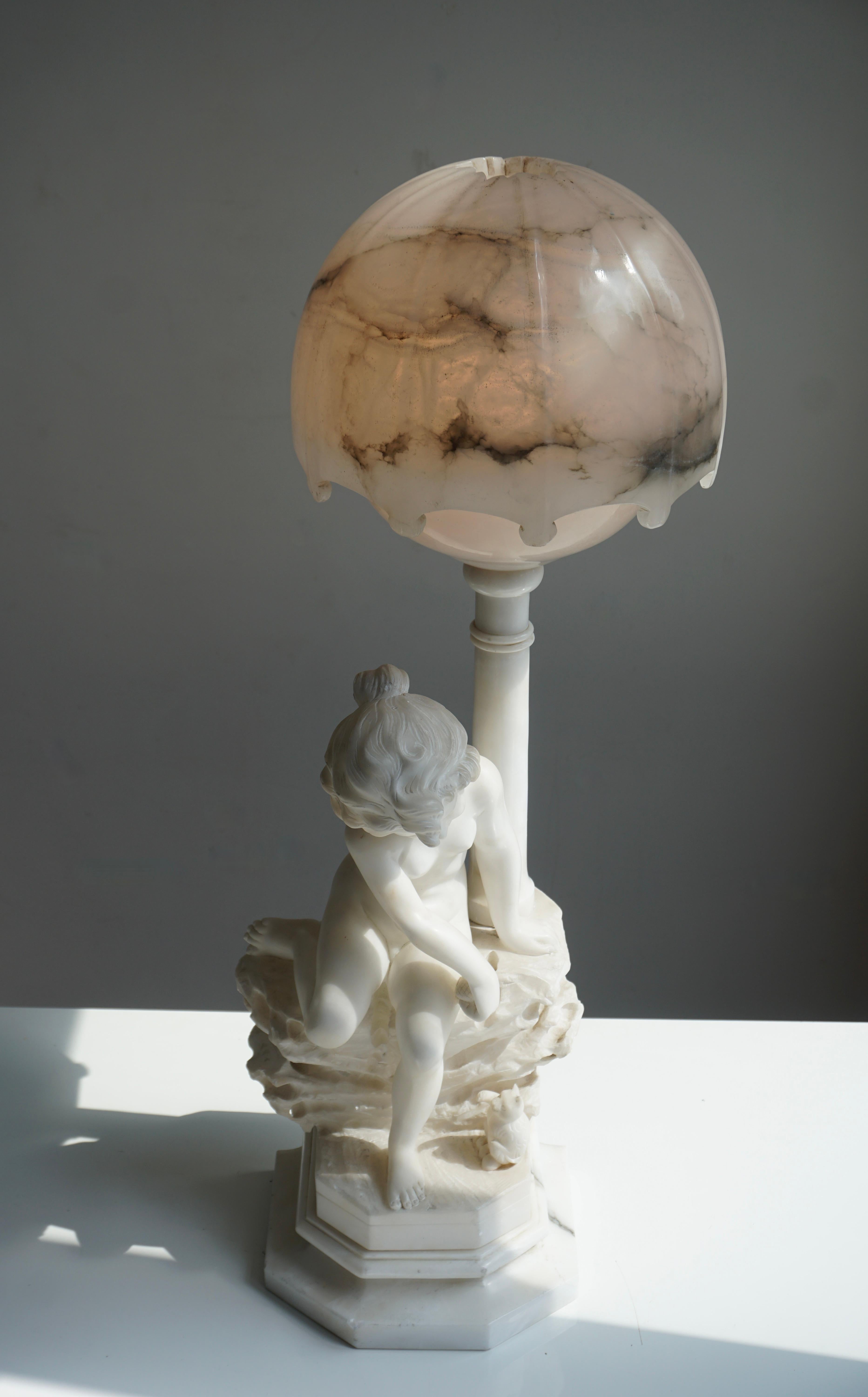 Early 20th Century Circa 1920 Carved Alabaster Figural Lamp on Onxy Base For Sale