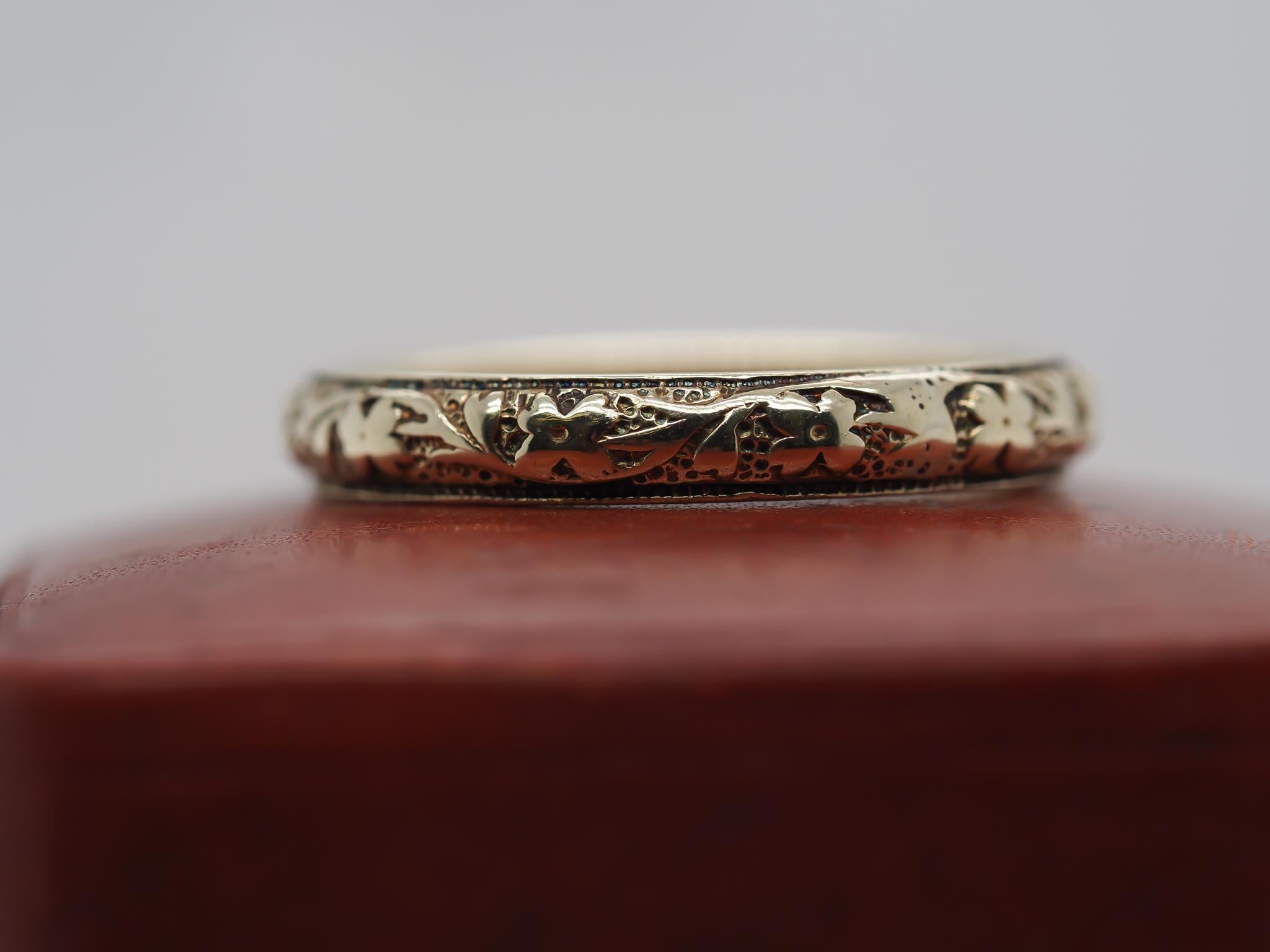 Year: 1920, Engraved “6-13-20”
Item Details:
Ring Size: 6.75 (Sizable)
Metal Type: 14K Yellow Gold [Hallmarked, and Tested]
Weight: 3.5 grams
Band Width: 3.1 mm
Condition: Excellent

Art Deco