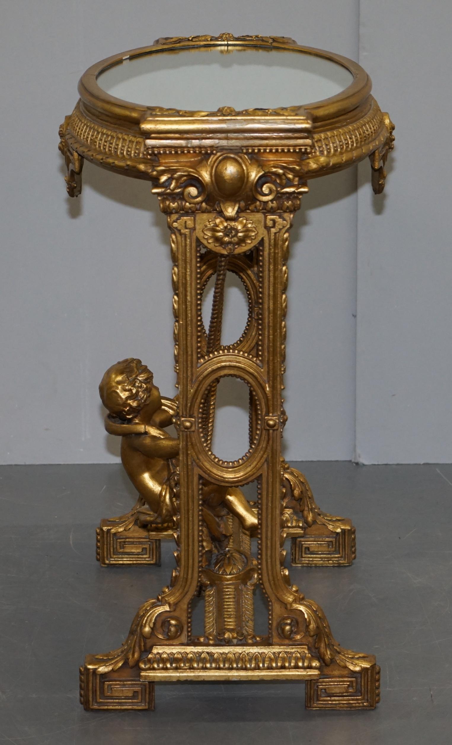 Gold Giltwood Occasional Table with Mirror Top and Cherub Putti Swing circa 1920 For Sale 14