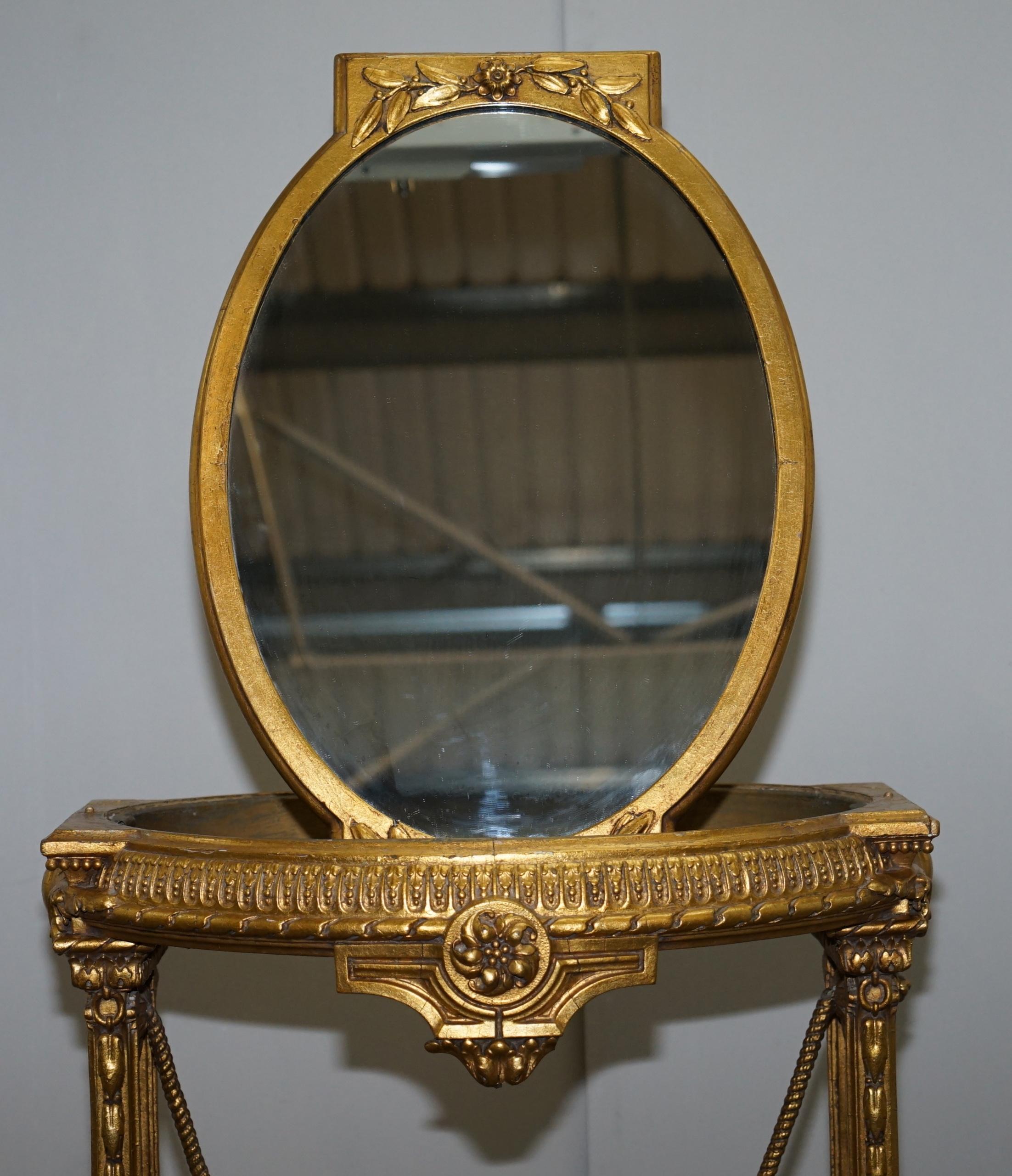 Table d'appoint en bois doré et doré avec plateau en miroir et pivotement de chérubin, vers 1920 en vente 2