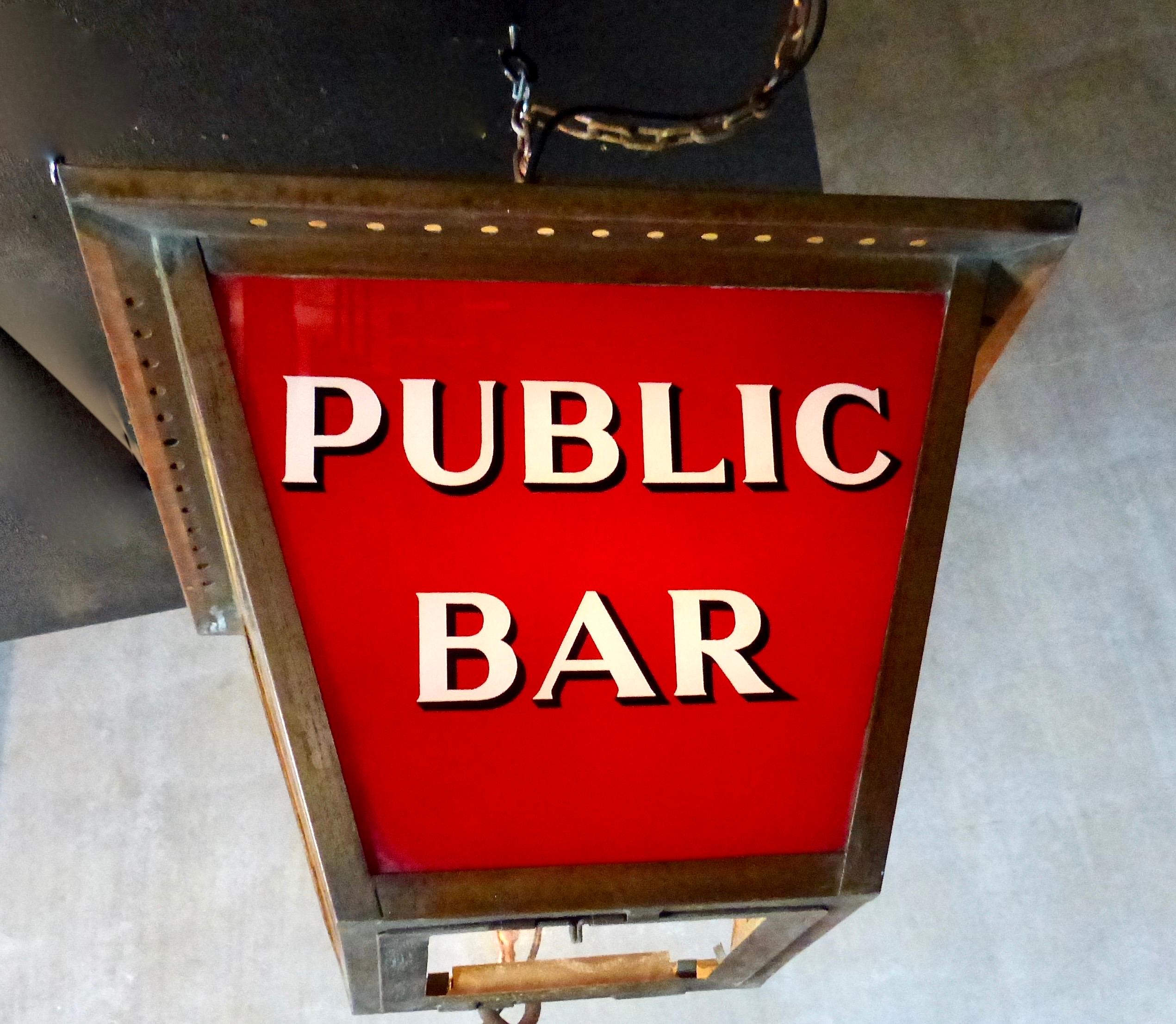 Set of five circa 1930s reverse-painted electric signs from an English pub. Four-sided copper frame, and some original ‘pebbled’ glass intact. Illuminated signs, in bright red, include The Ash Tree, Smoke Room, Triangle Tavern, Queen’s Head, and