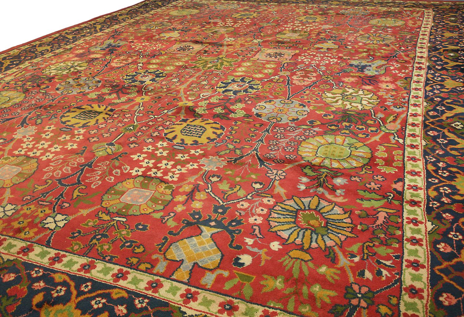 A luxurious royal carpet with a stylized motif design and all over field. This carpet comes from the most beautiful part of Ireland, Donegal. An area that despite appearing isolated has been able to maintain its traditions like weaving rugs. The