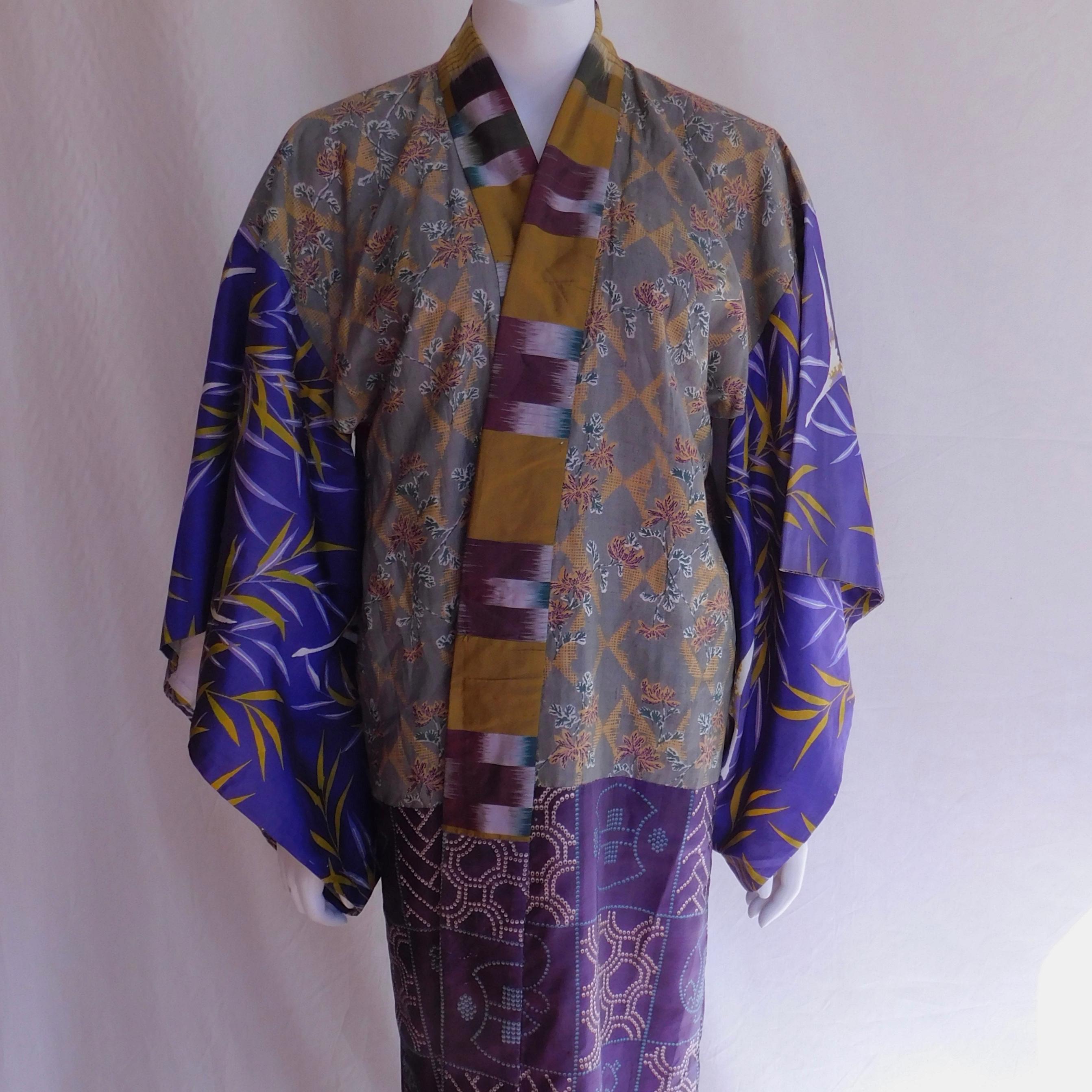 An elegant patchwork Taisho period Japanese juban kimono, circa 1920. Constructed of hand painted and block printed with a silk ikat collar. Soft woven cotton lining. In good overall condition with some wear to bottom hem.
Lovely to wear or hang on