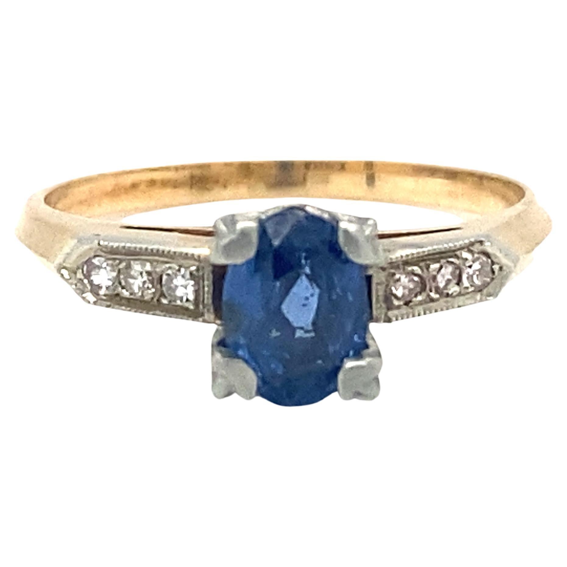 Circa 1920s 1 Carat Oval No Heat Sapphire and Diamond Ring in Two-Tone Gold