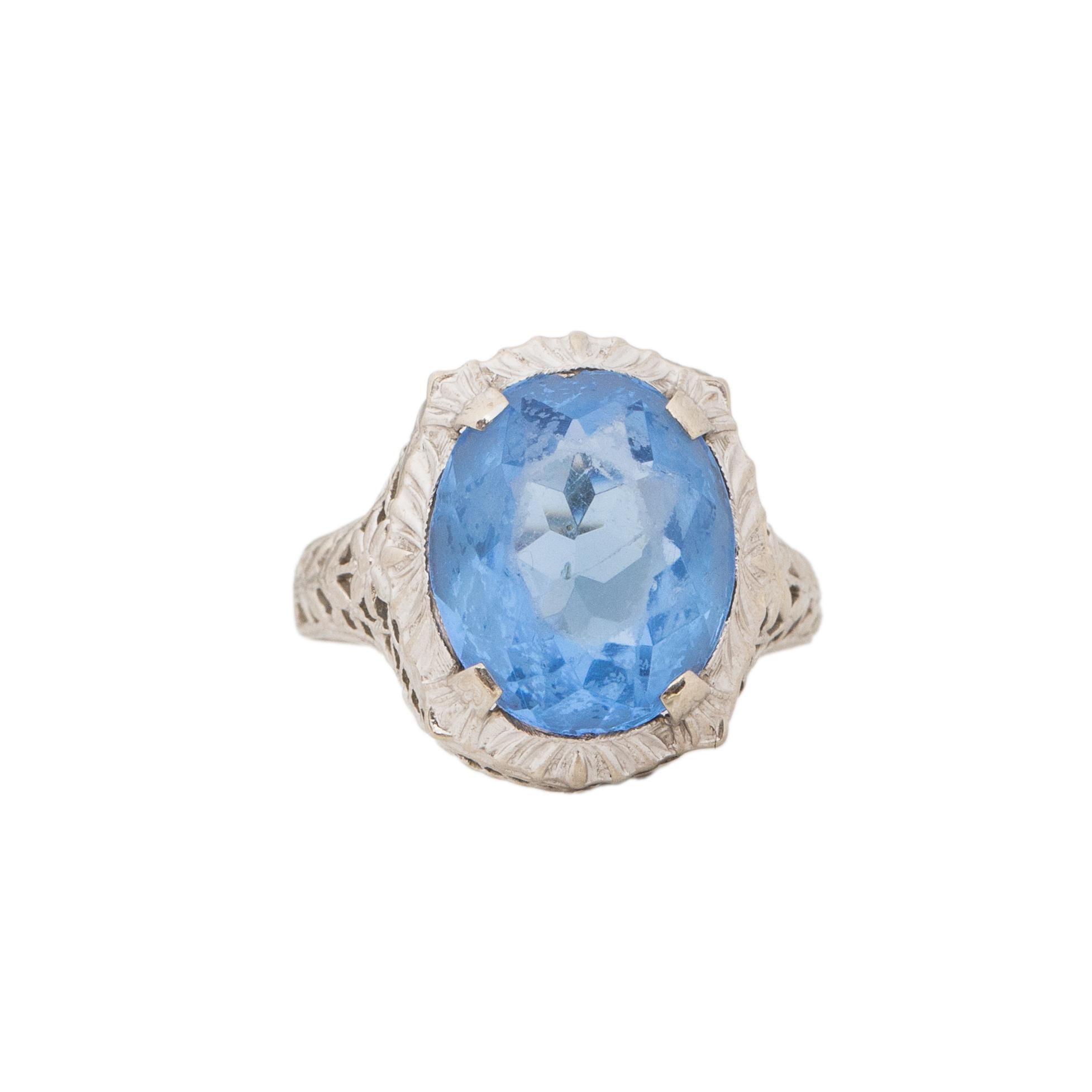 Circa 1920's 10K White Gold Vintage Filigree Blue Gem Fashion Ring
