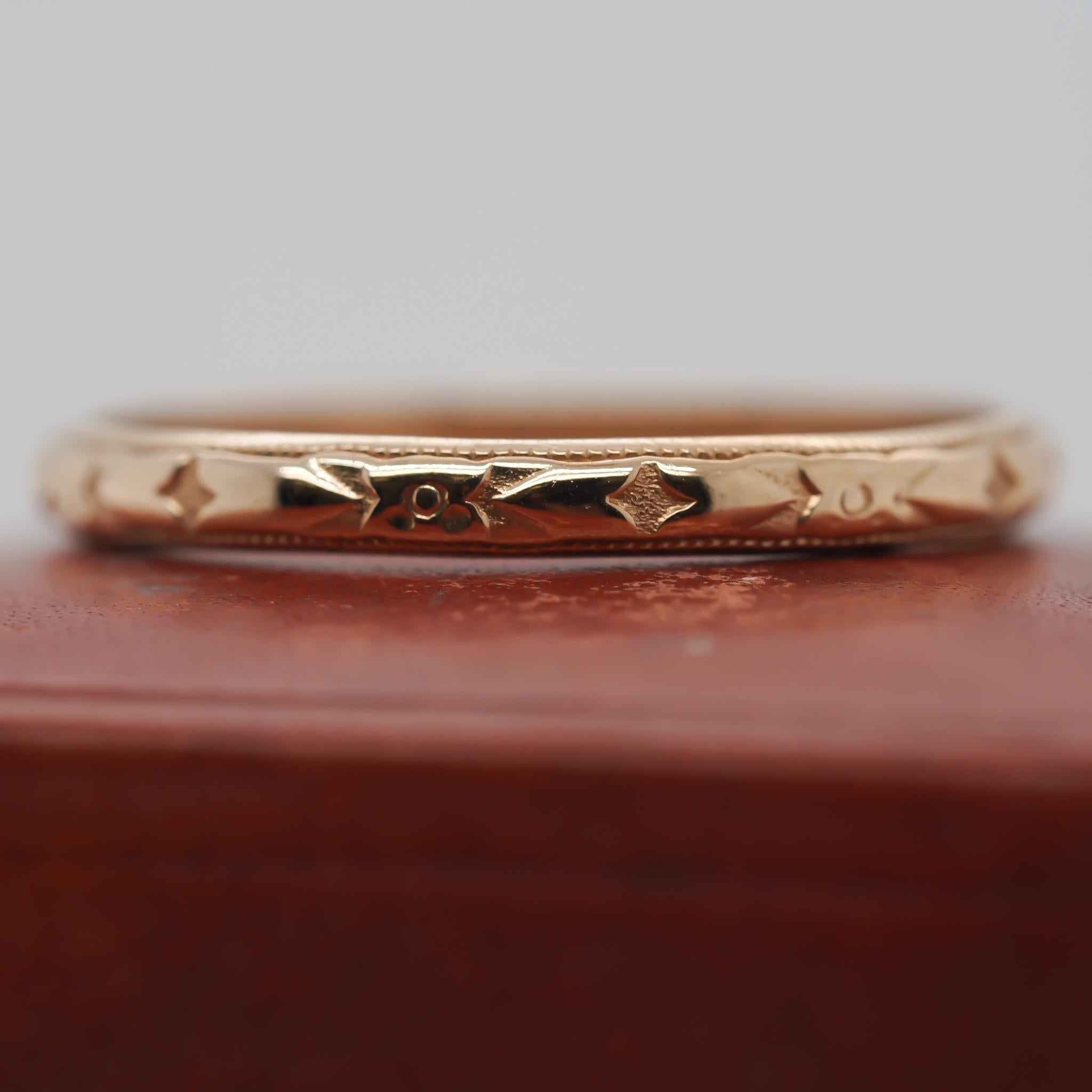 Year: 1920s
Item Details:
Ring Size: 7.5 (Sizable)
Metal Type: 14K Yellow Gold [Hallmarked, and Tested]
Weight: 2.5 grams
Band Width: 2.25
Condition: Excellent