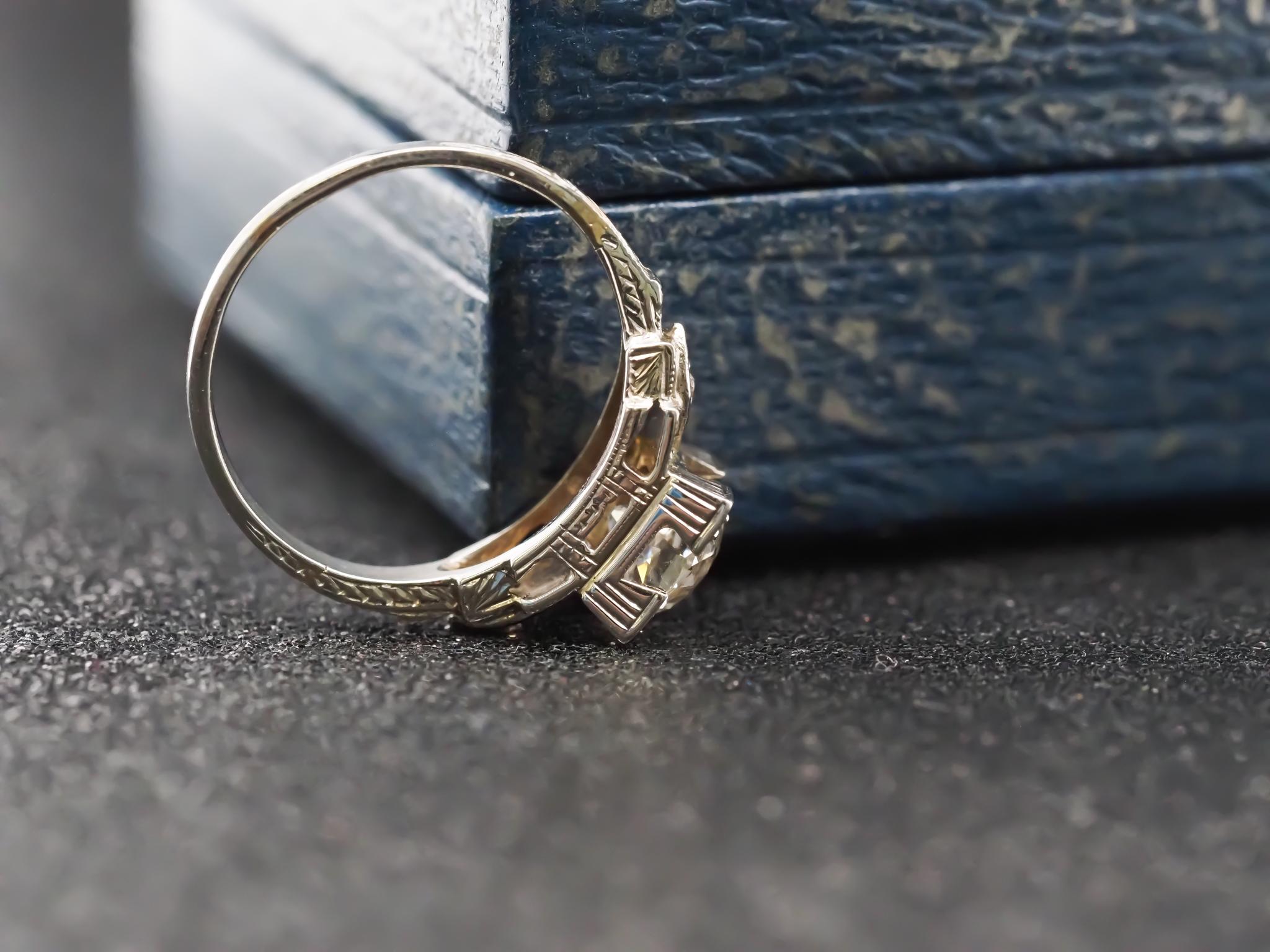 Year: 1920s
Item Details:
Ring Size: 5.75  (Sizable)
Metal Type: 18K White Gold  [Hallmarked, and Tested]
Weight: 2.9 grams
Center Diamond Details:
1.20ct, Natural Diamond, Old European Cut Diamond, J color, SI2 clarity
Band Width: 1.7mm
Condition: 